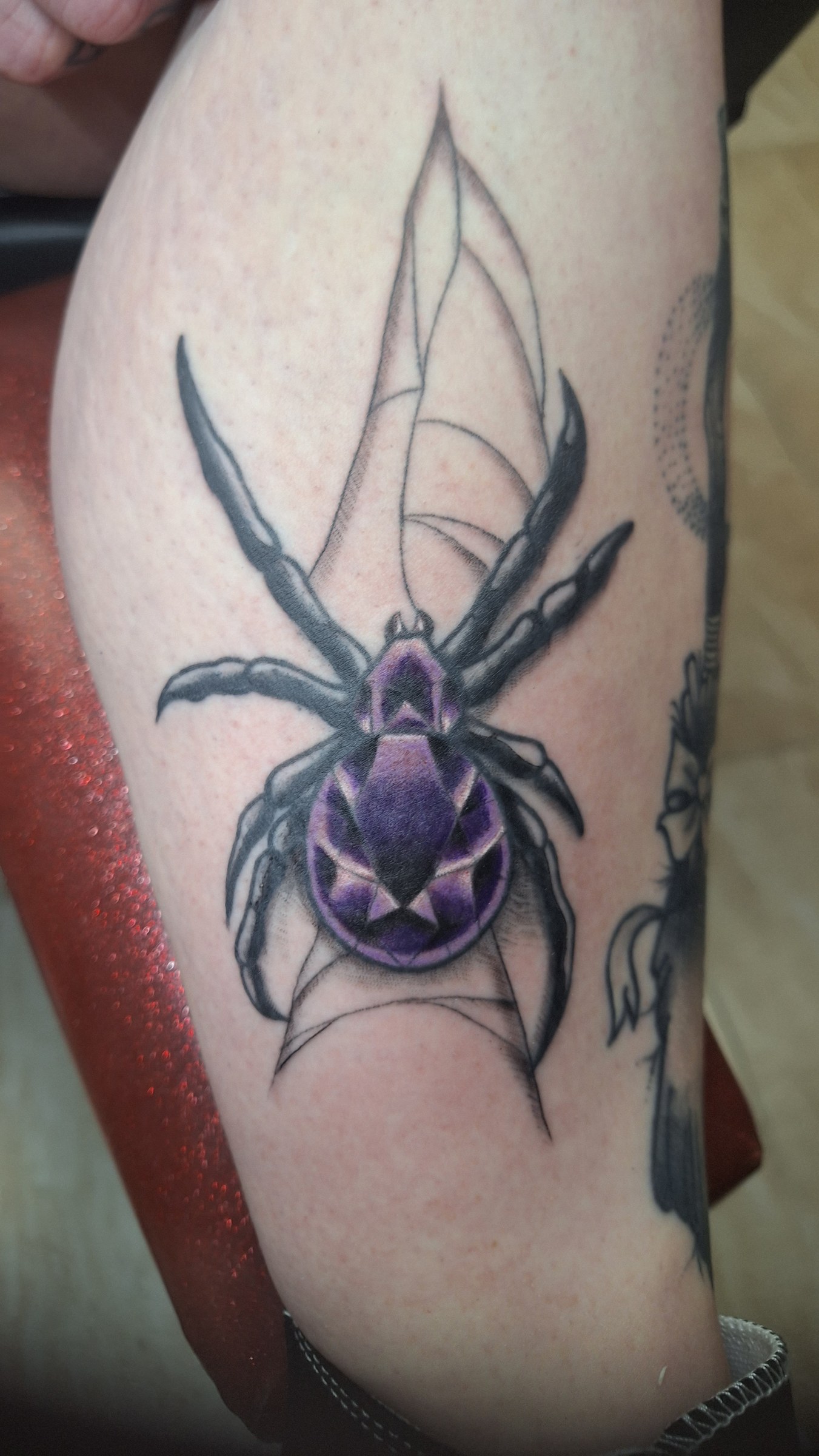 Purple beetle tattoo by Rob Scotti