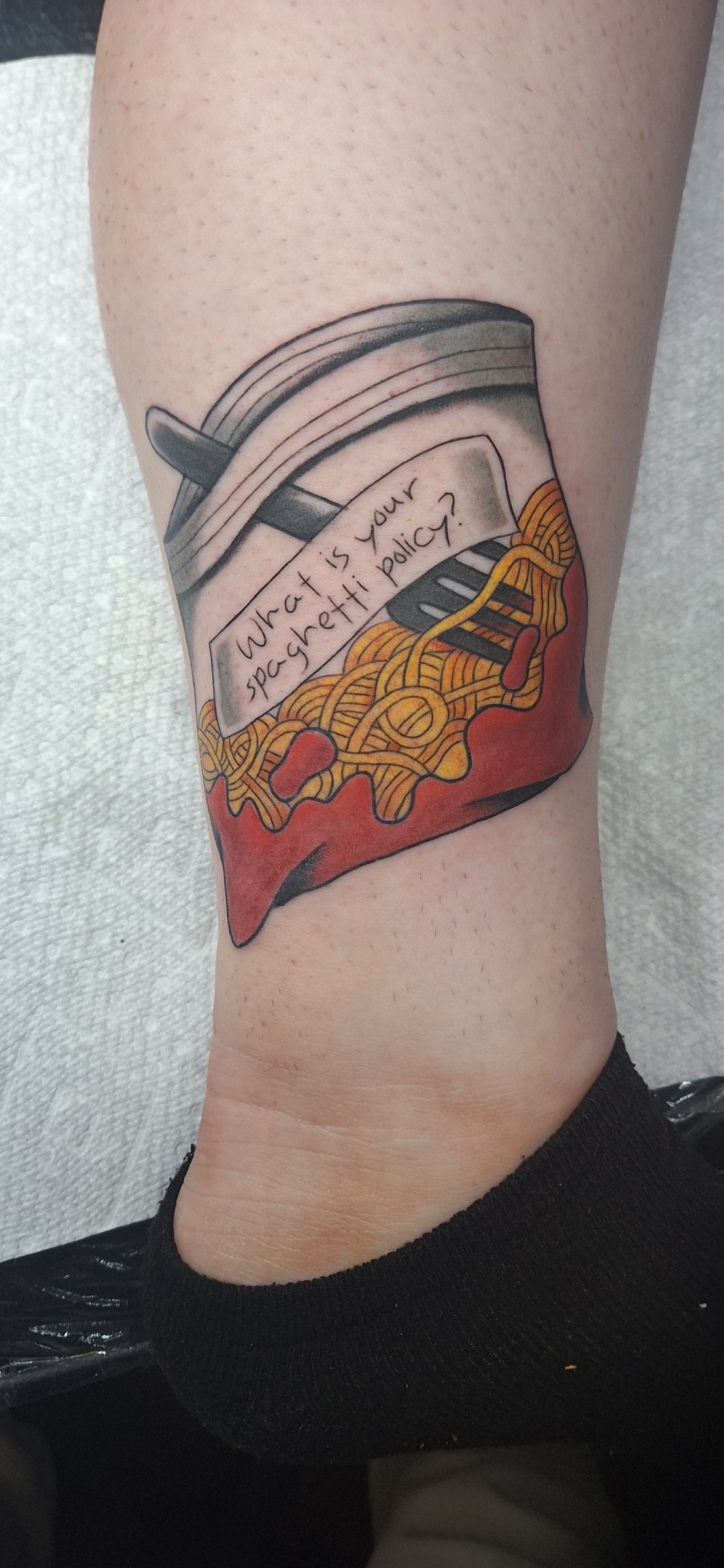 Colorful boot tattoo by Rob Scotti