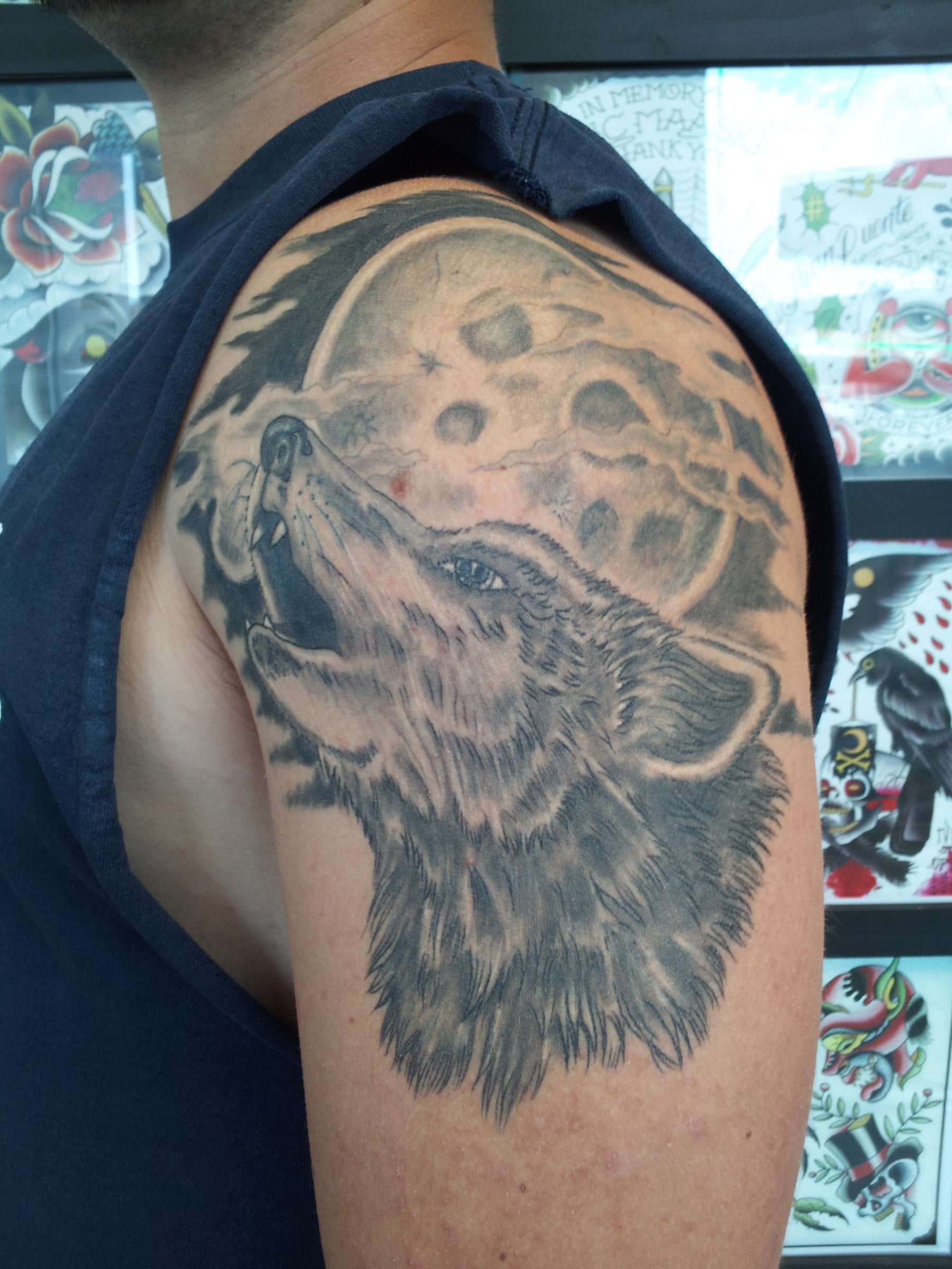 Wolf and moon tattoo by Joe Kennedy