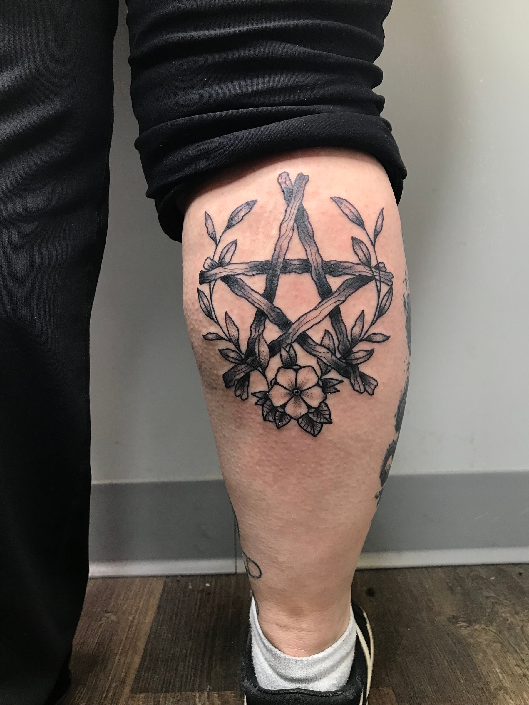 Arrows and floral geometric tattoo by Rob Scotti