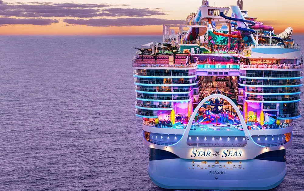 Star of the Seas cruise ship at sunset, viewed from the stern