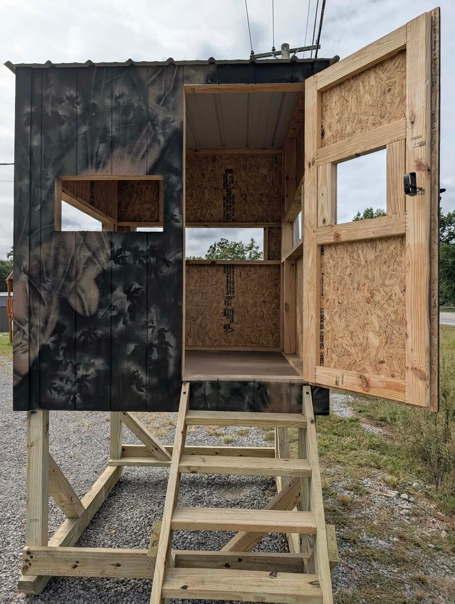 Open door and entry steps on the Elite Outdoors camouflage hunting blind