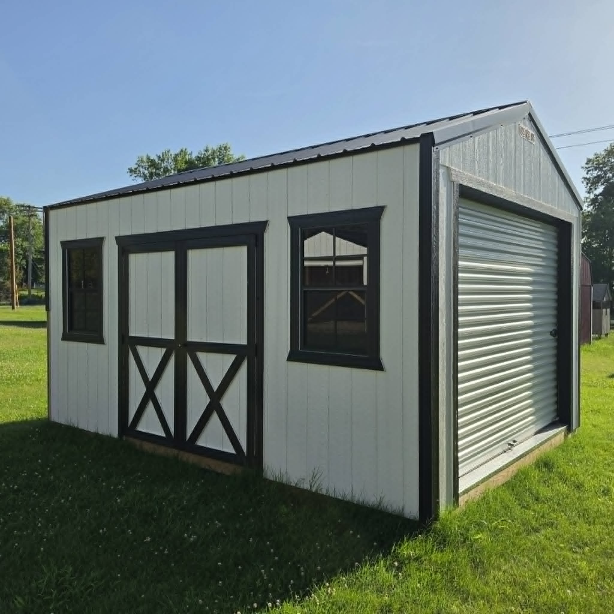 Portable building with windows and double doors