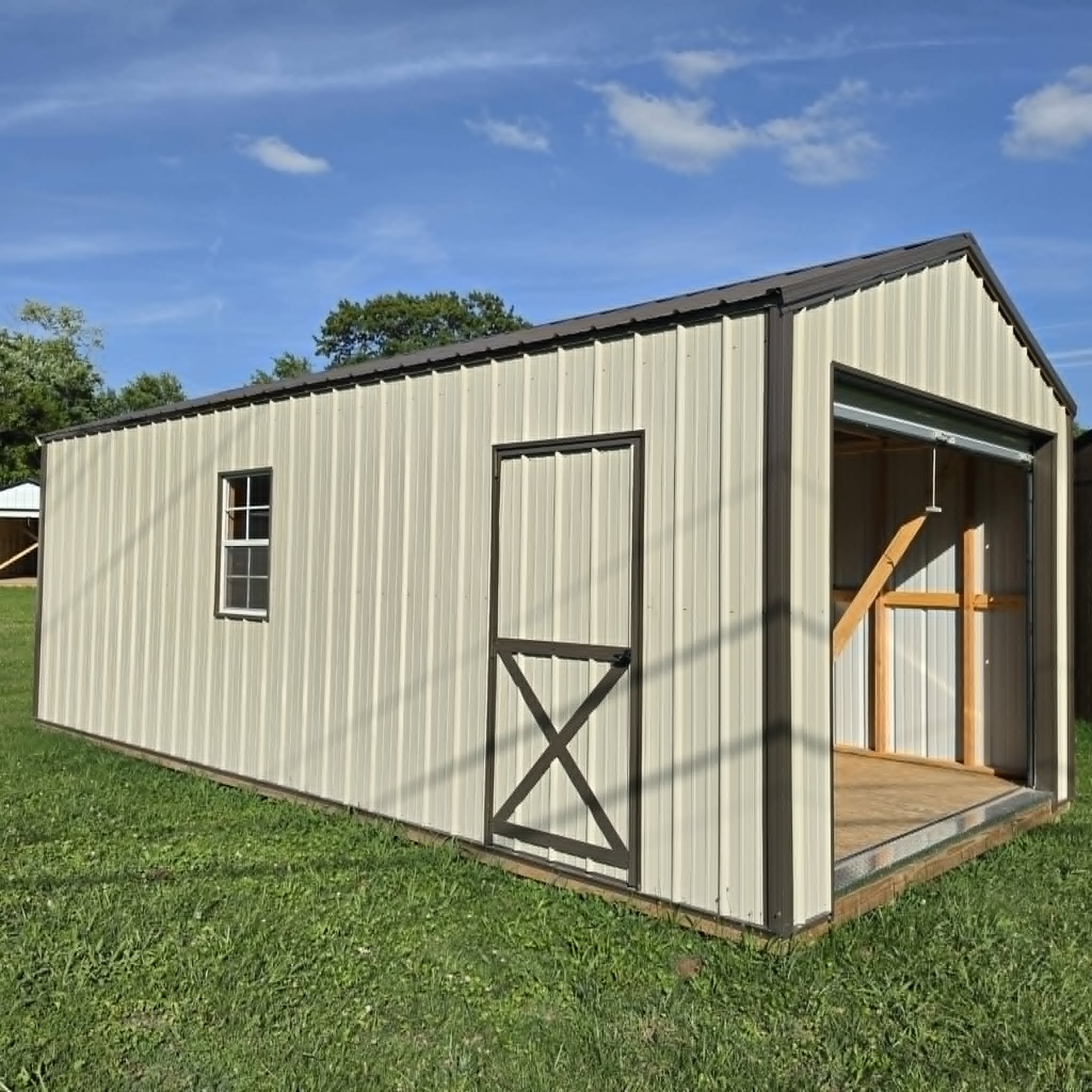 Gray portable building with side entry