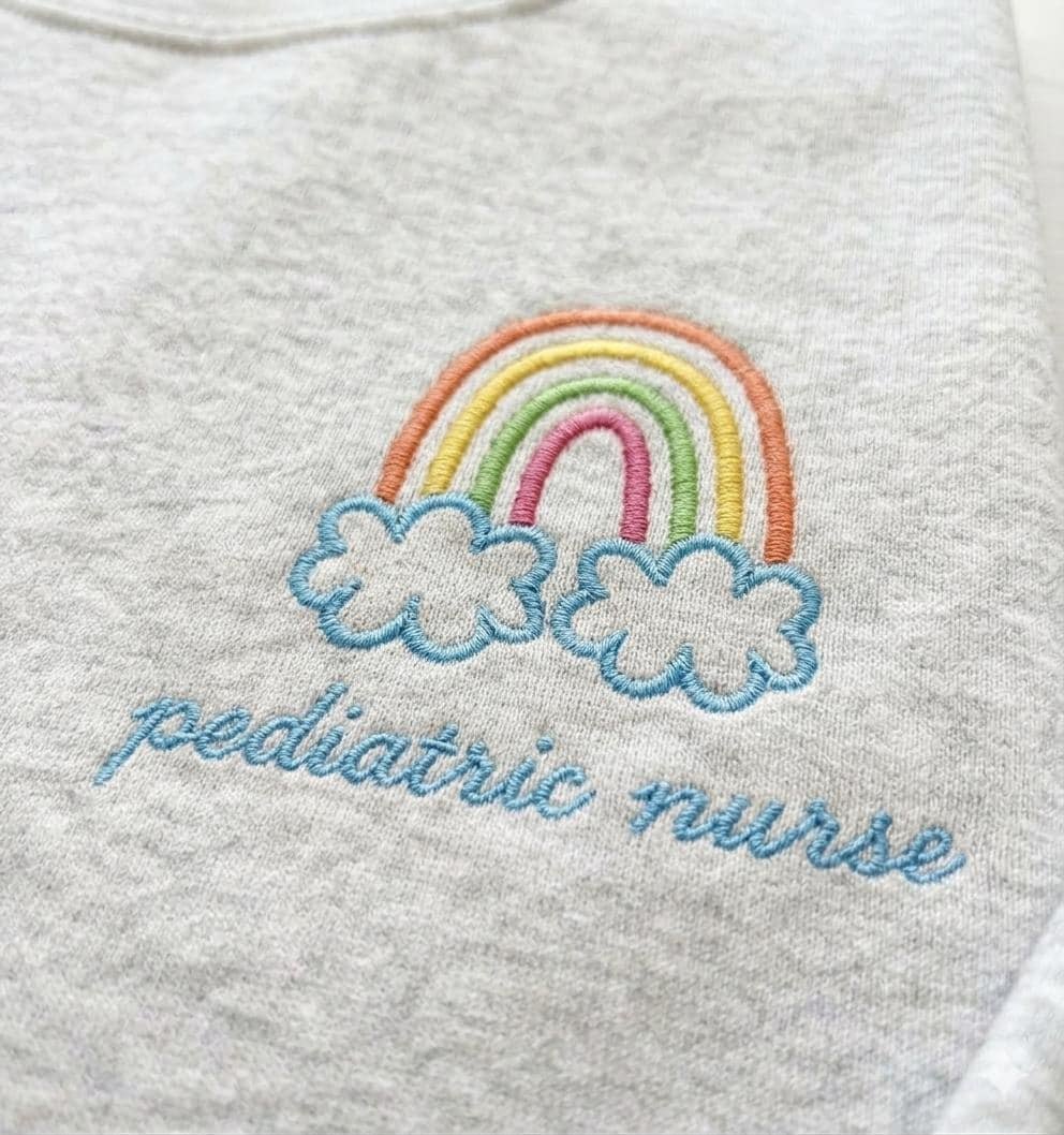 Pediatric nurse Rainbow Cloud Illustration Crewneck, new grad RN nurses week gift detail 2