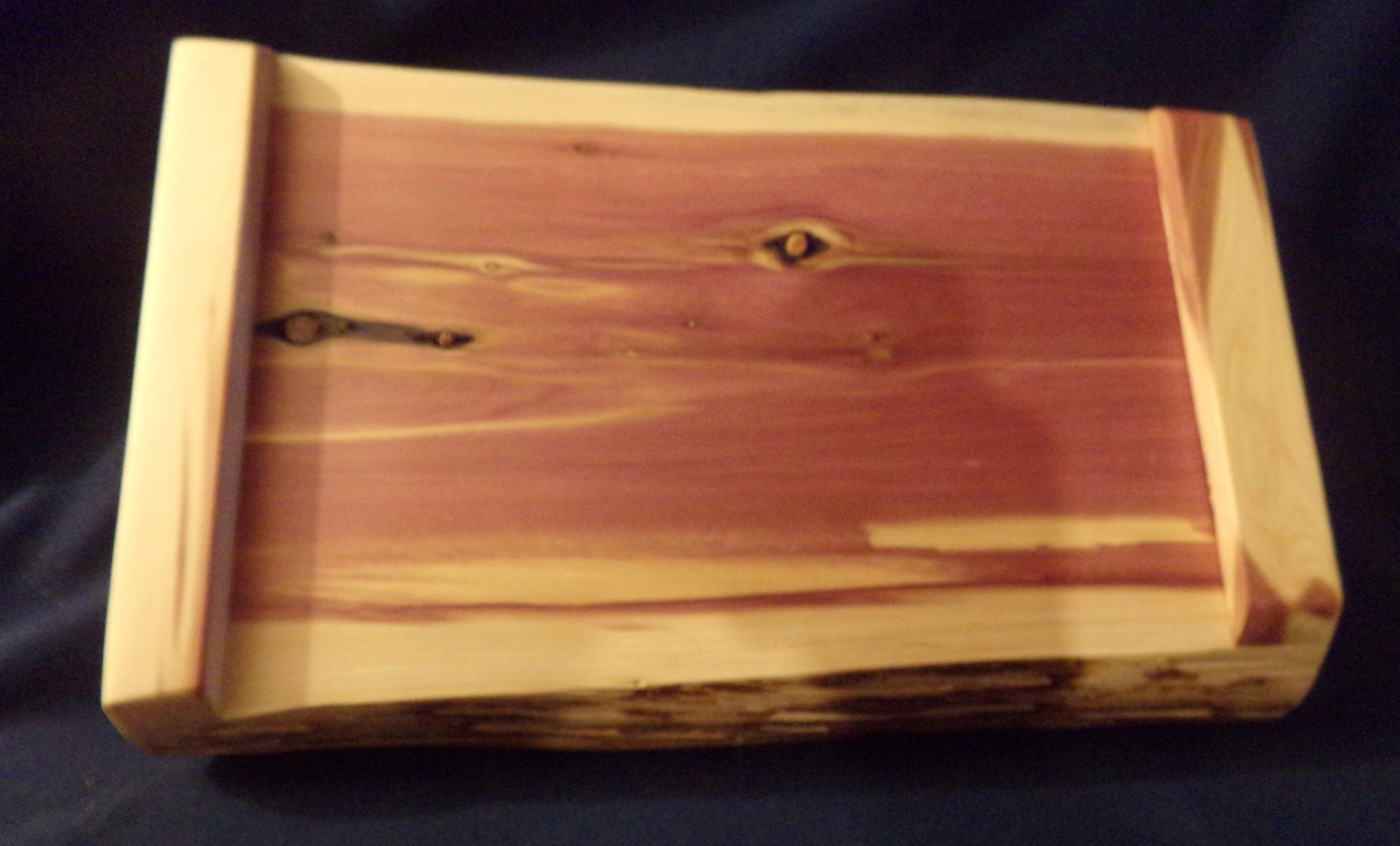 Natural wood grain in a Juniper charcuterie board