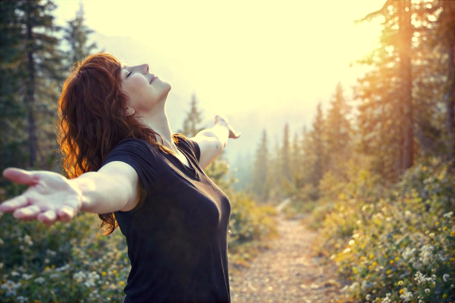 Kristina Mumma embracing sunlight outdoors