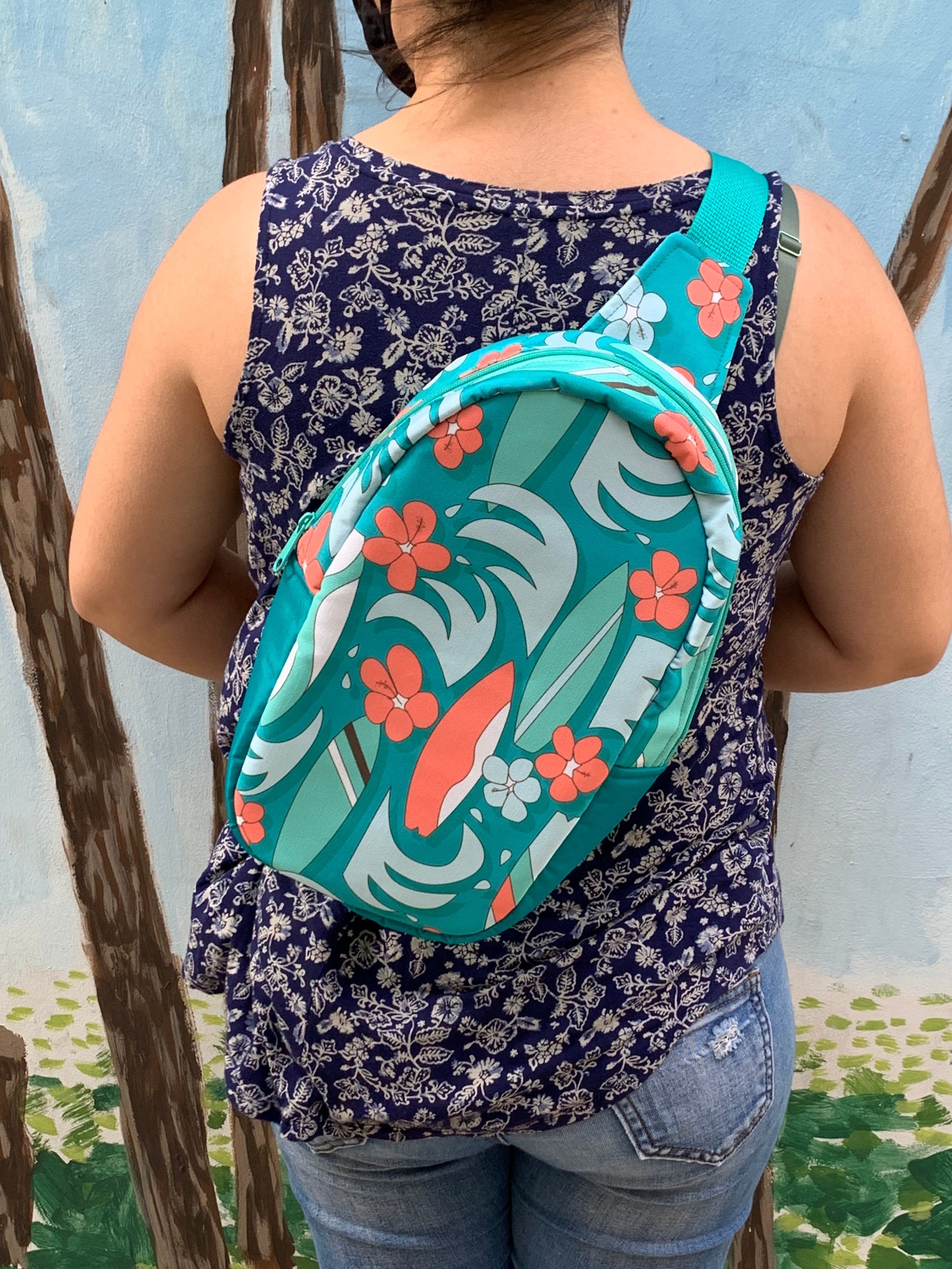 Surfboards and Plumerias Bullet Sling-pack Backpack, view 5