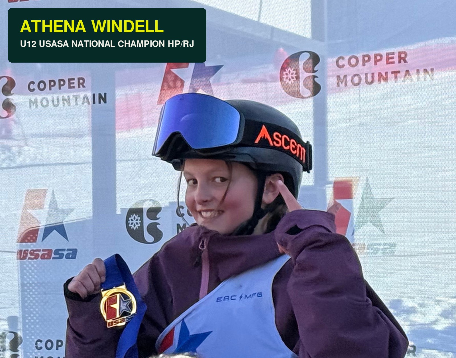 Athena Windell holding her U12 USASA National Champion medal