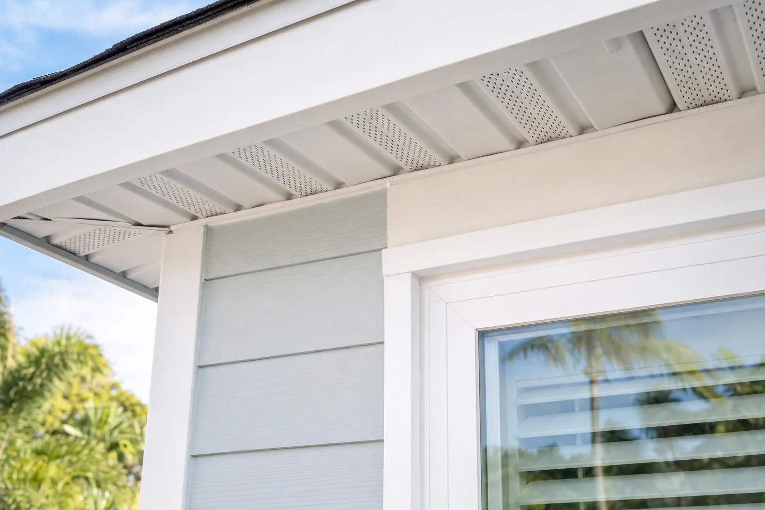 White exterior trim, soffit and siding details on a Florida home