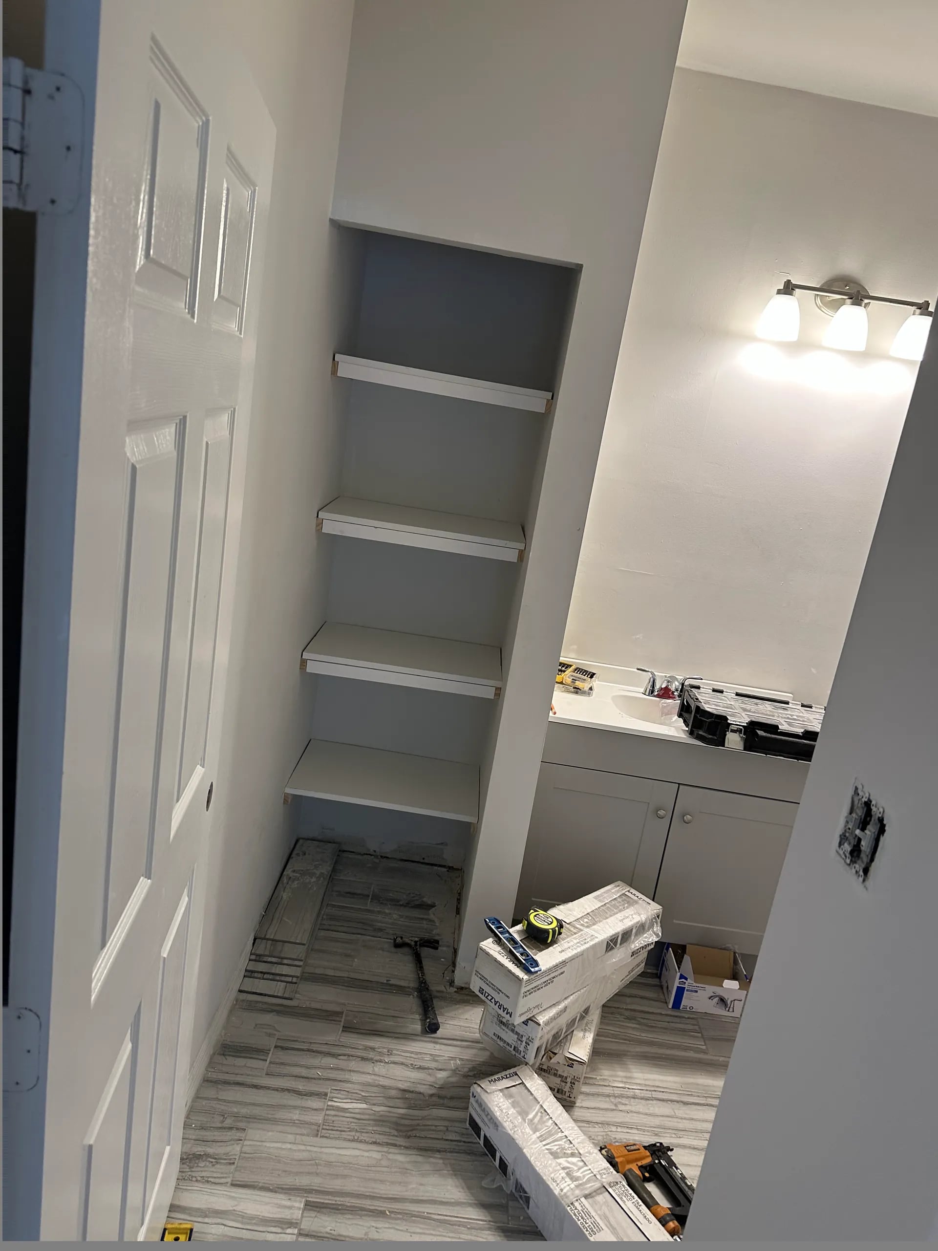 Interior bathroom area protected and prepared during a Good Fellas home update