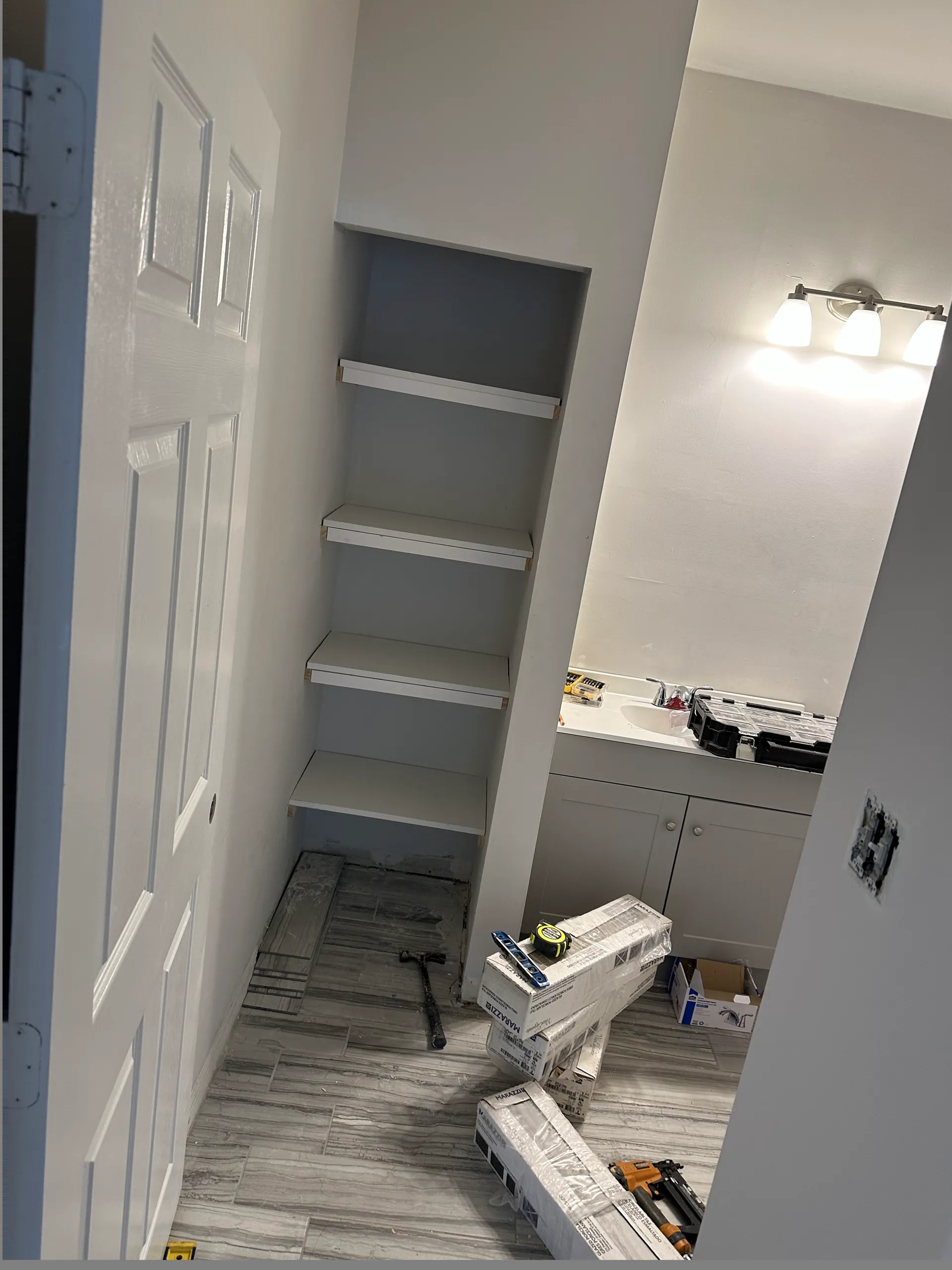 Bathroom shelving installation