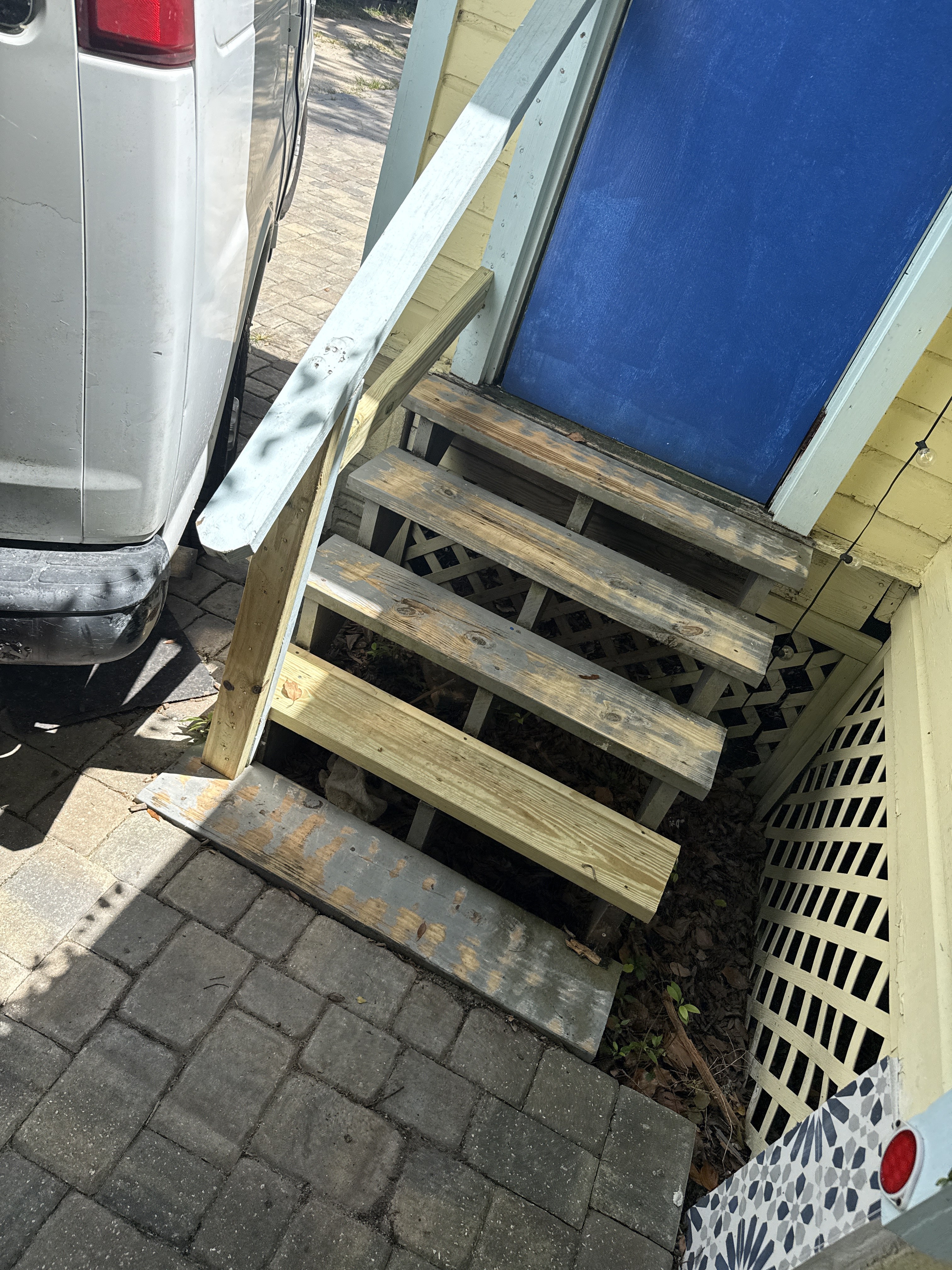 Historic entry steps before painting and repair