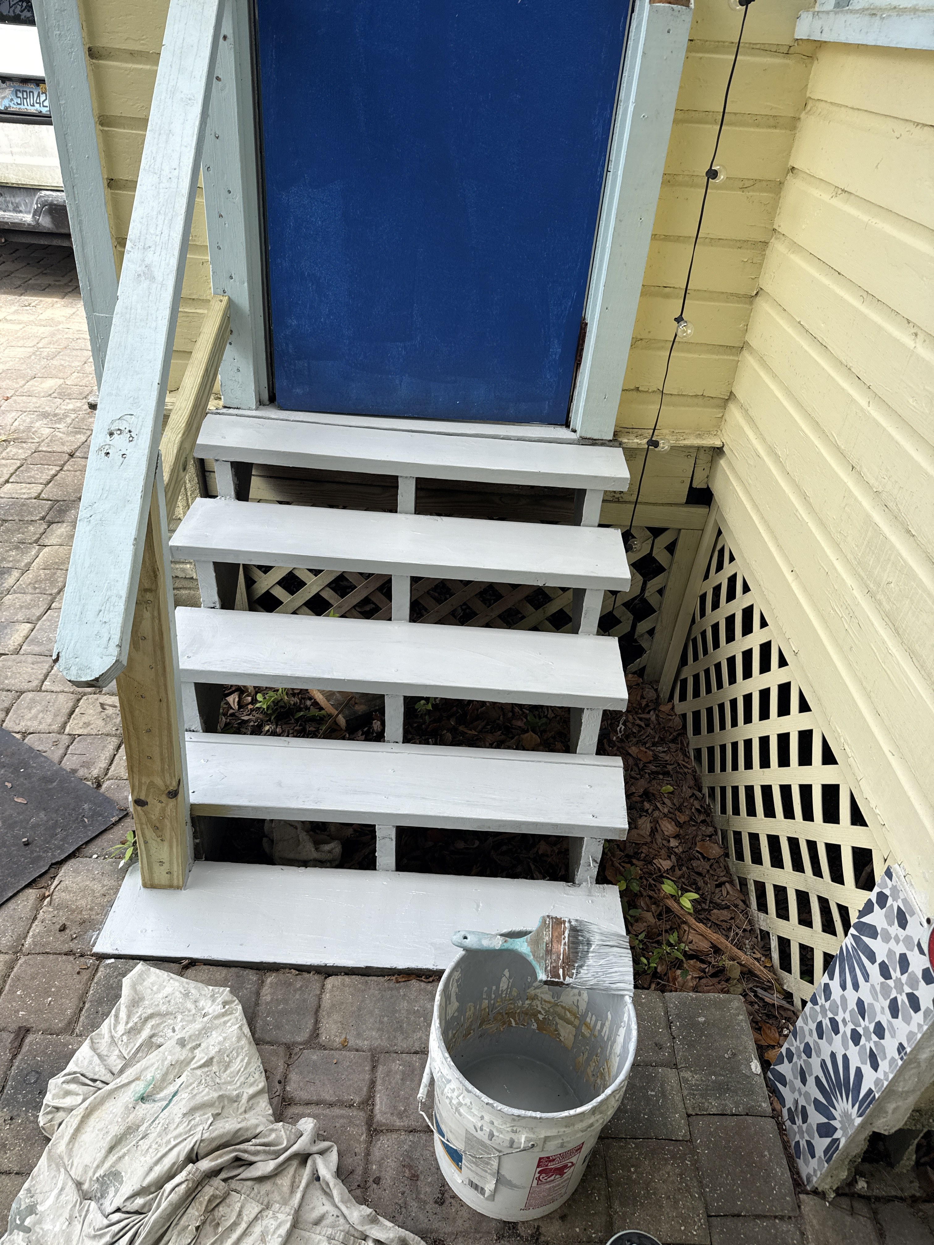 Historic entry steps freshly painted during restoration