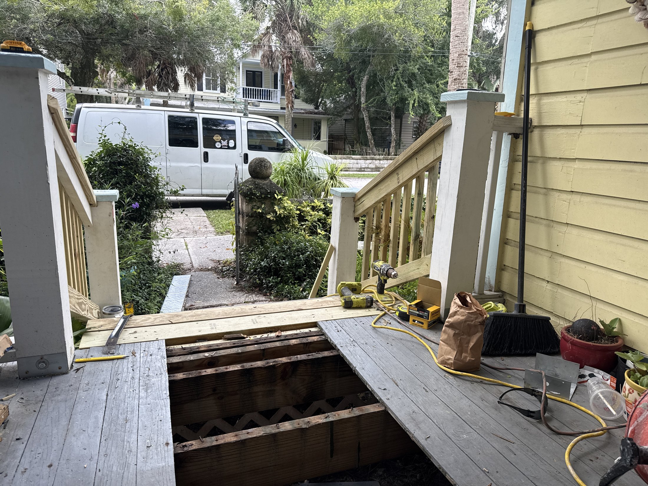 New porch railings and entry framing in progress at the historic home