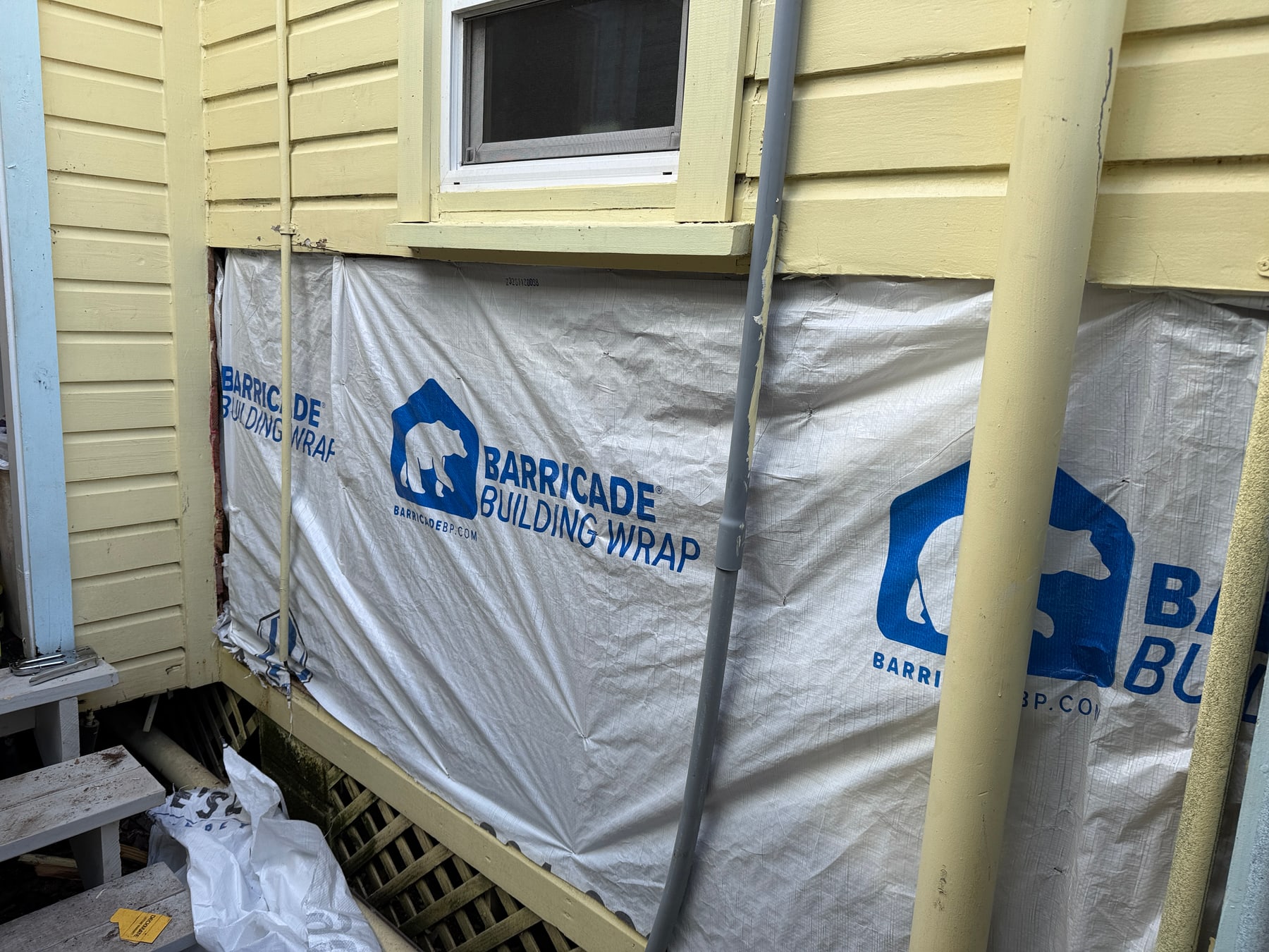 Weather barrier installed on the exterior wall during the historic St. Augustine restoration