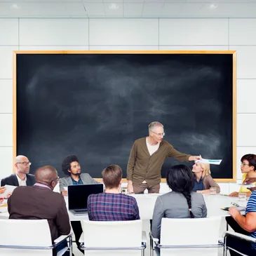 A teacher leading a classroom discussion
