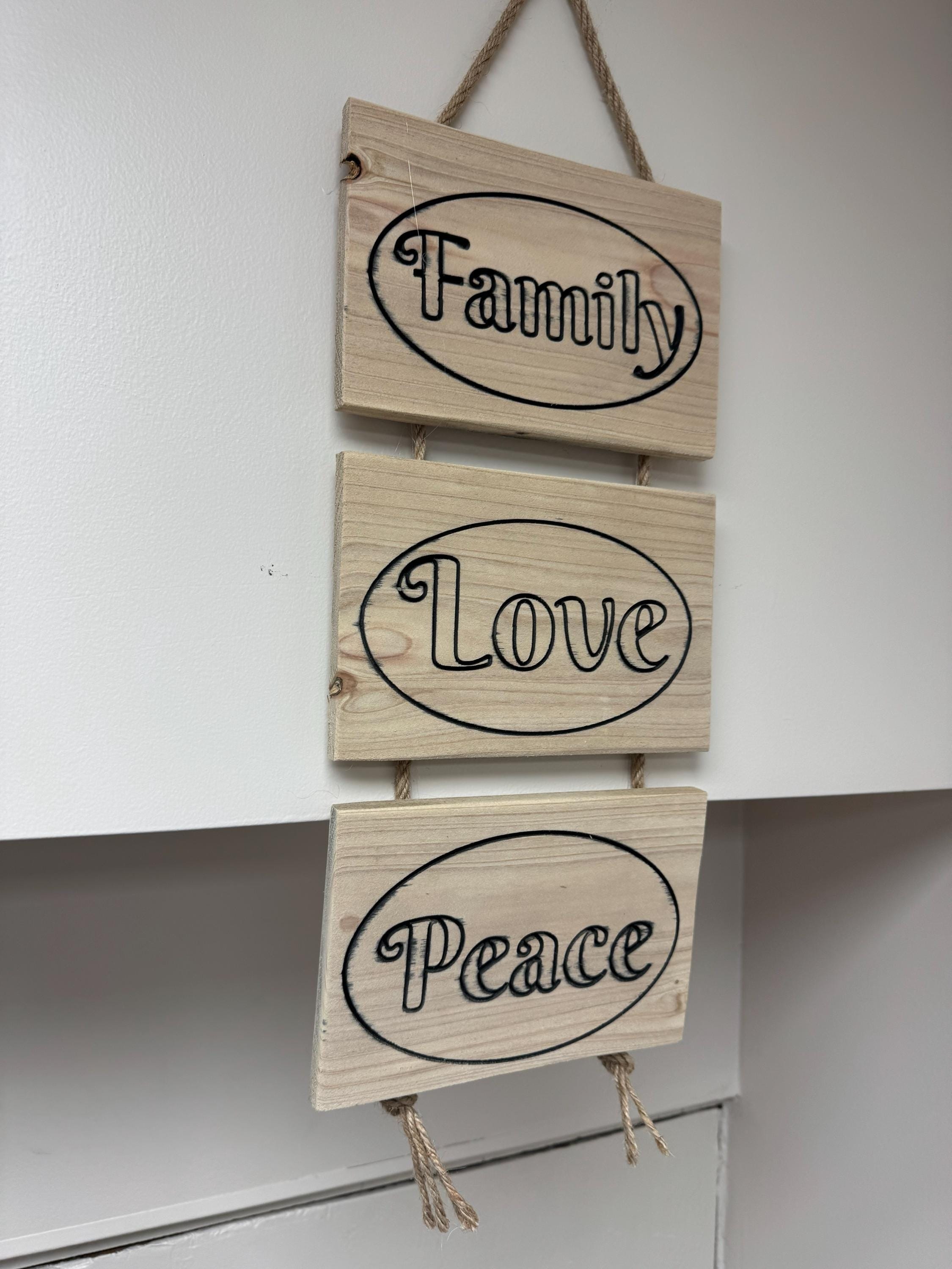 Family Sign | Rustic Wooden Wall Hanging with Love and Peace, view 2