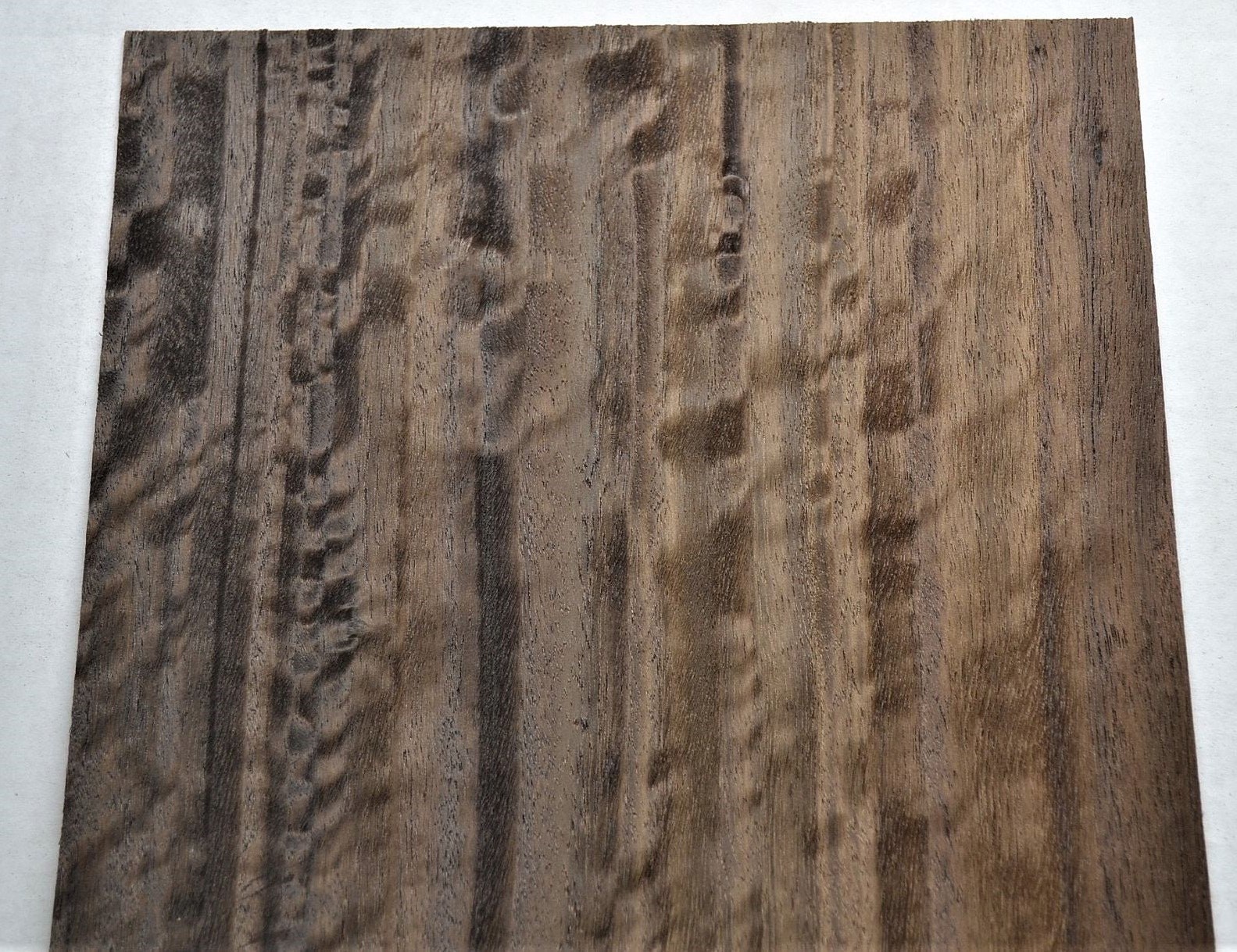 Raw wood veneer sheet with straight, even grain