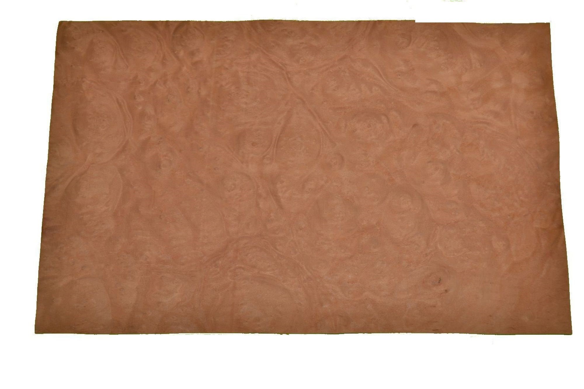Raw wood veneer sheet showing natural figured grain