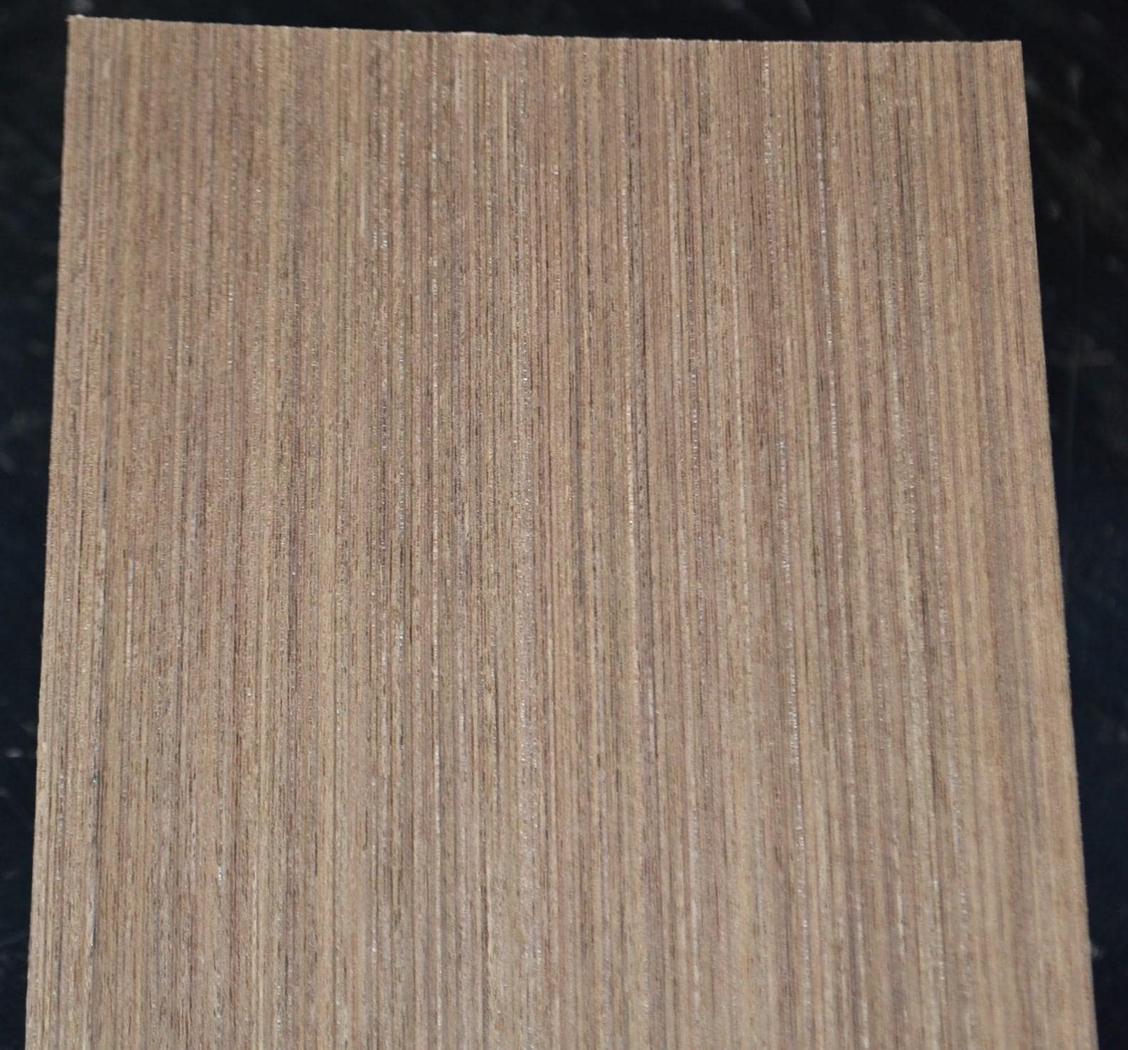Light-toned raw wood veneer sheet ready for a woodworking project