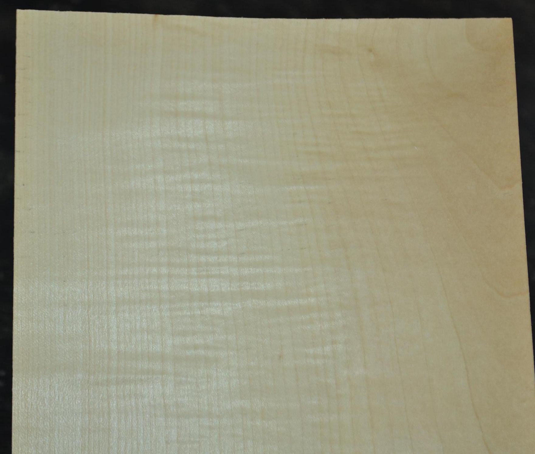 Raw wood veneer sheet with a varied natural grain pattern