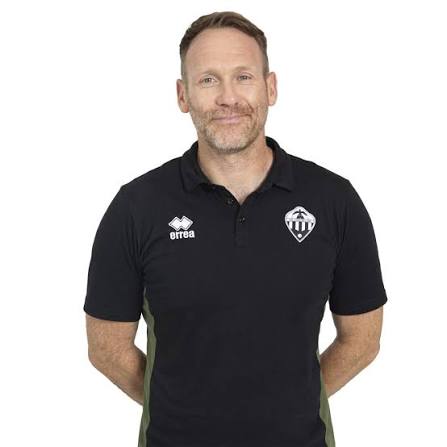 Simon Rusk wearing a CD Castellón polo shirt