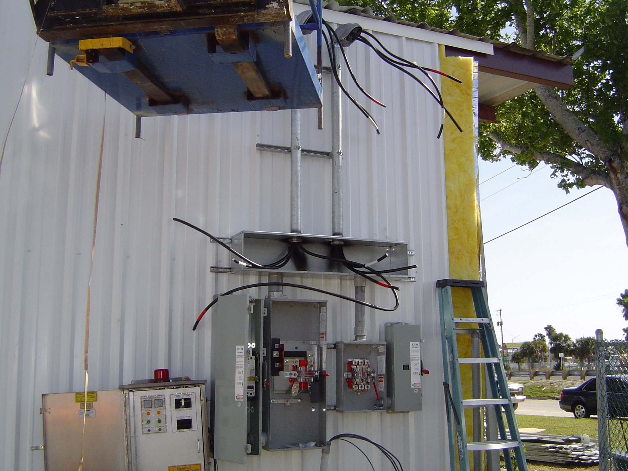 Electrician completing detailed electrical installation