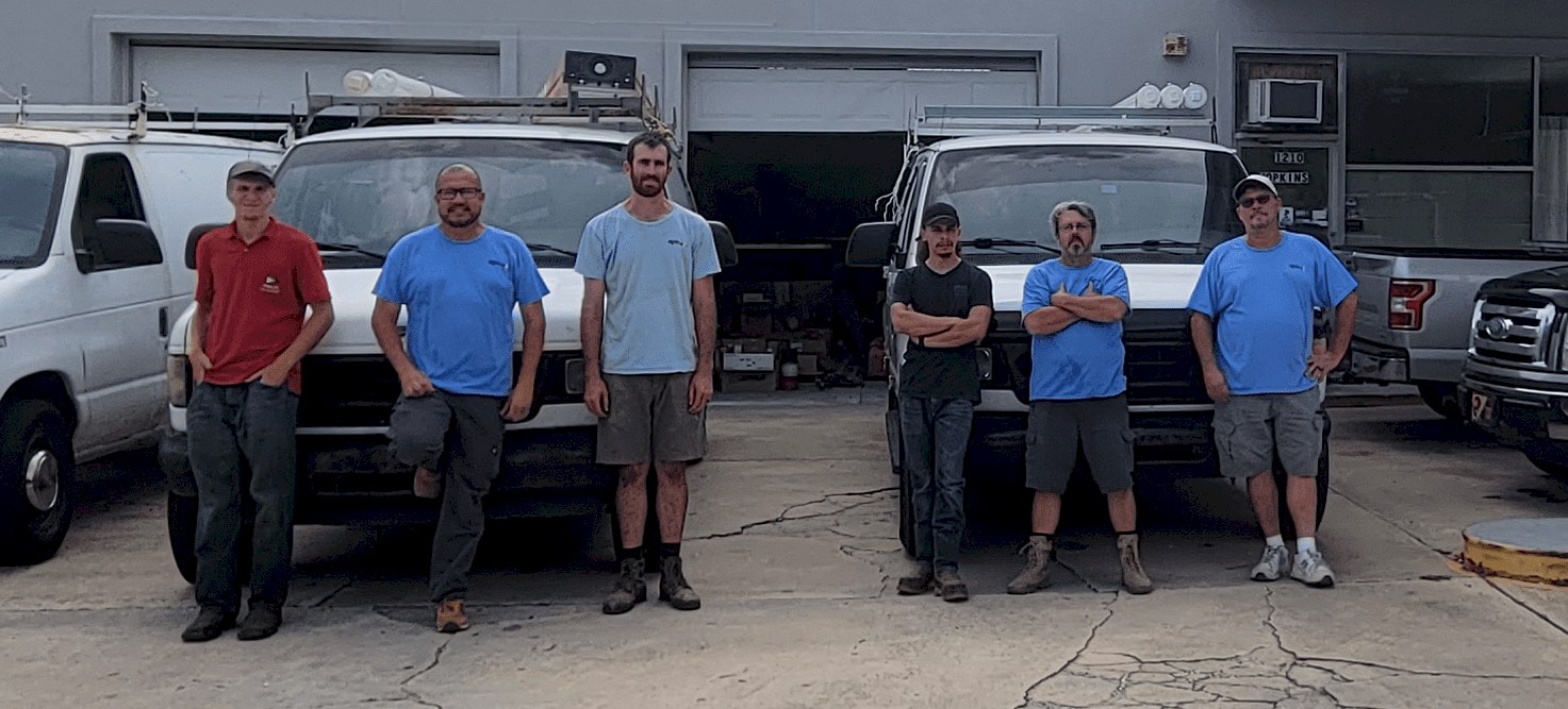 Advent Electric crew outside their Titusville facility