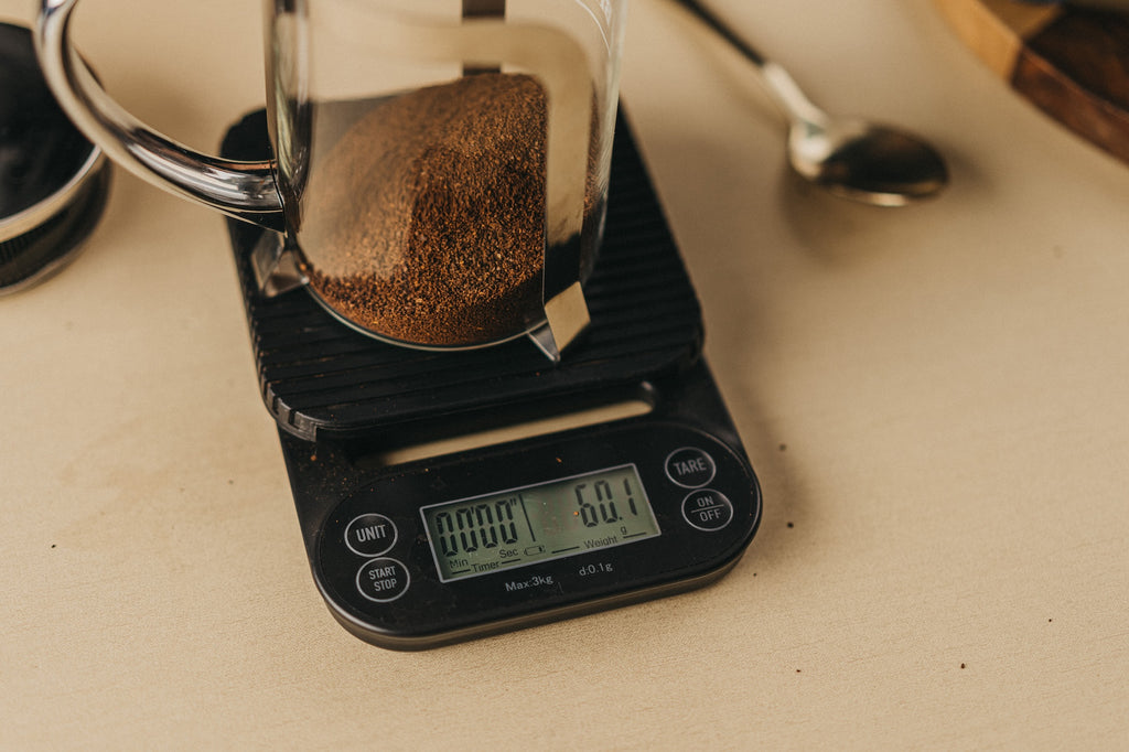 Coffee grounds measured on a digital scale for cold brew