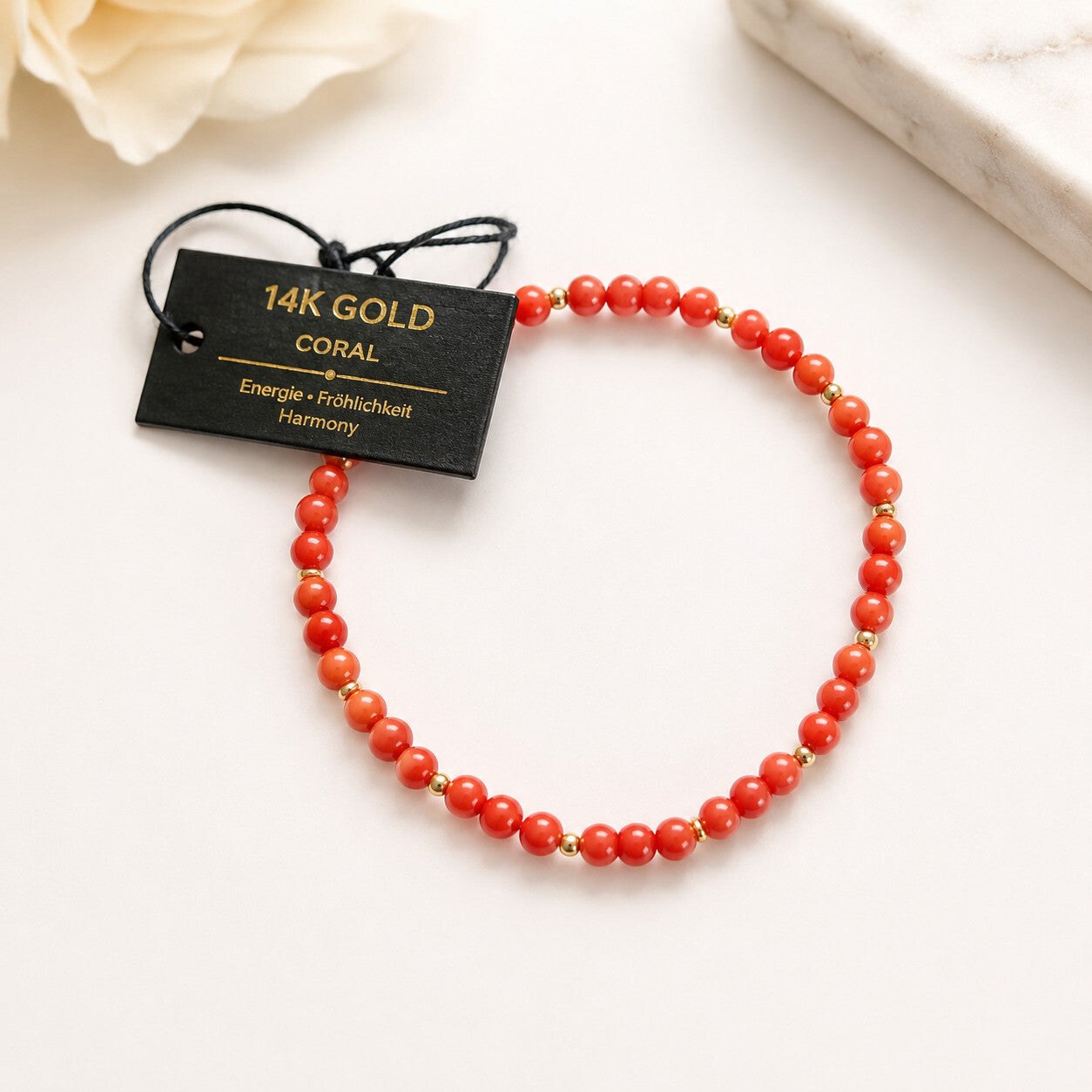 Gold and coral beaded bracelet