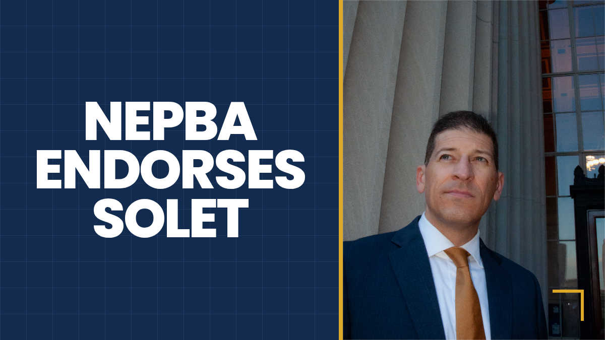 David Solet in front of courthouse columns with the message NEPBA endorses Solet