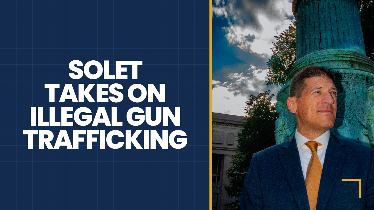 David Solet beside a courthouse monument with the message Solet takes on illegal gun trafficking
