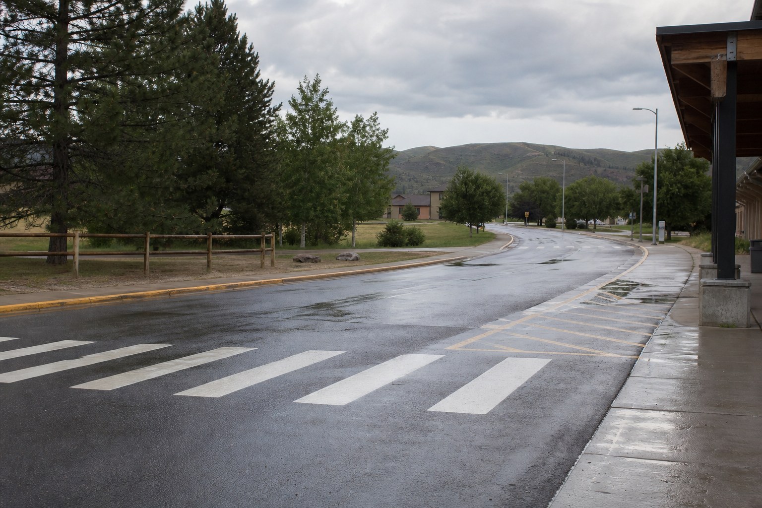 Montana school crosswalk and pickup lane after rain