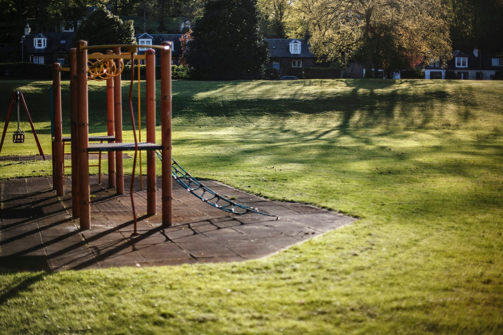 Empty playground in afternoon light