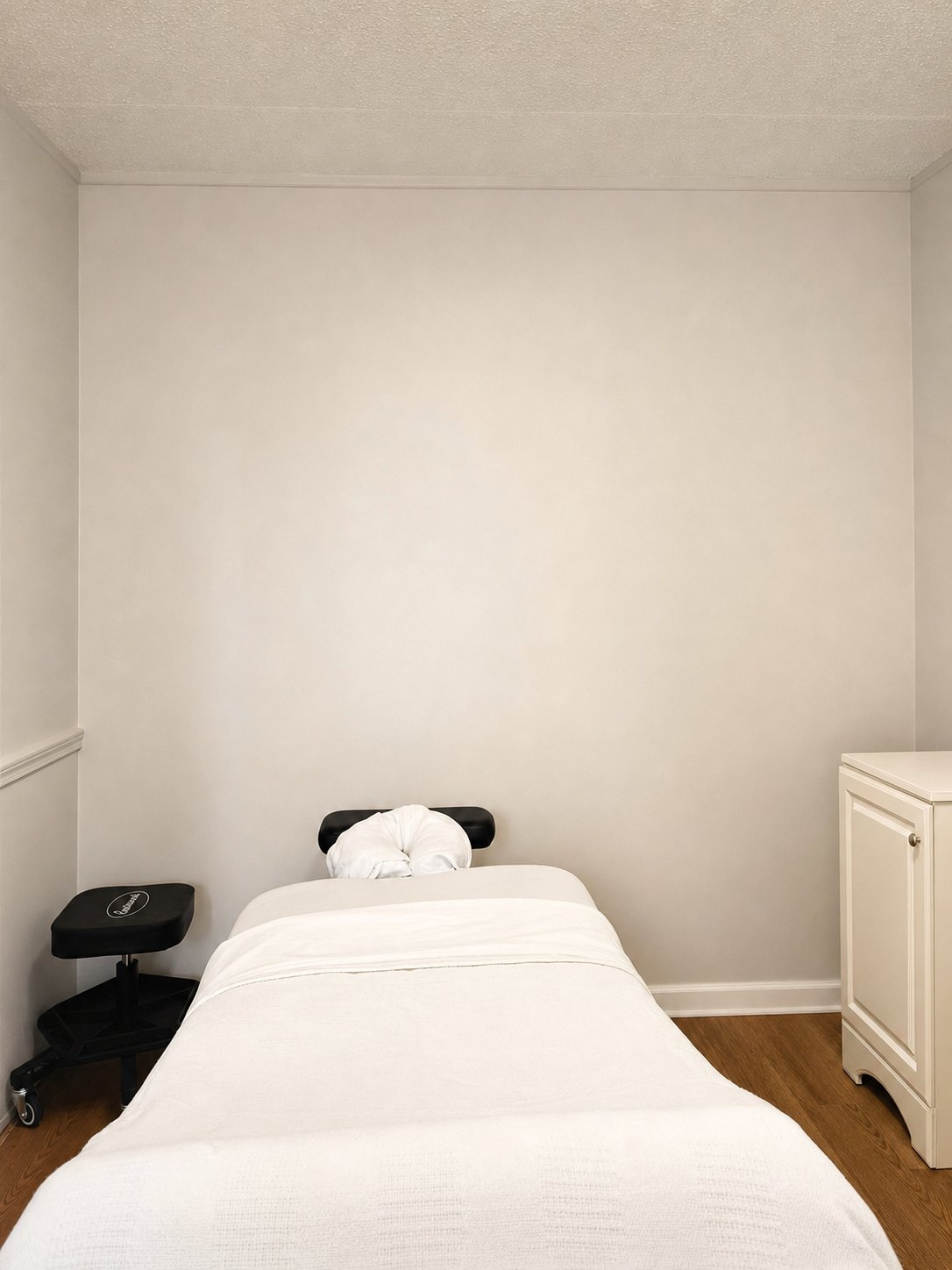 A calm treatment room prepared for therapeutic bodywork