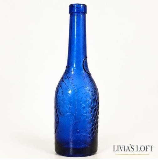 Vintage Cobalt Blue Textured Glass Bottle | Embossed Grapes & Leaves | 12” Decorative Art Glass Bottle, view 1