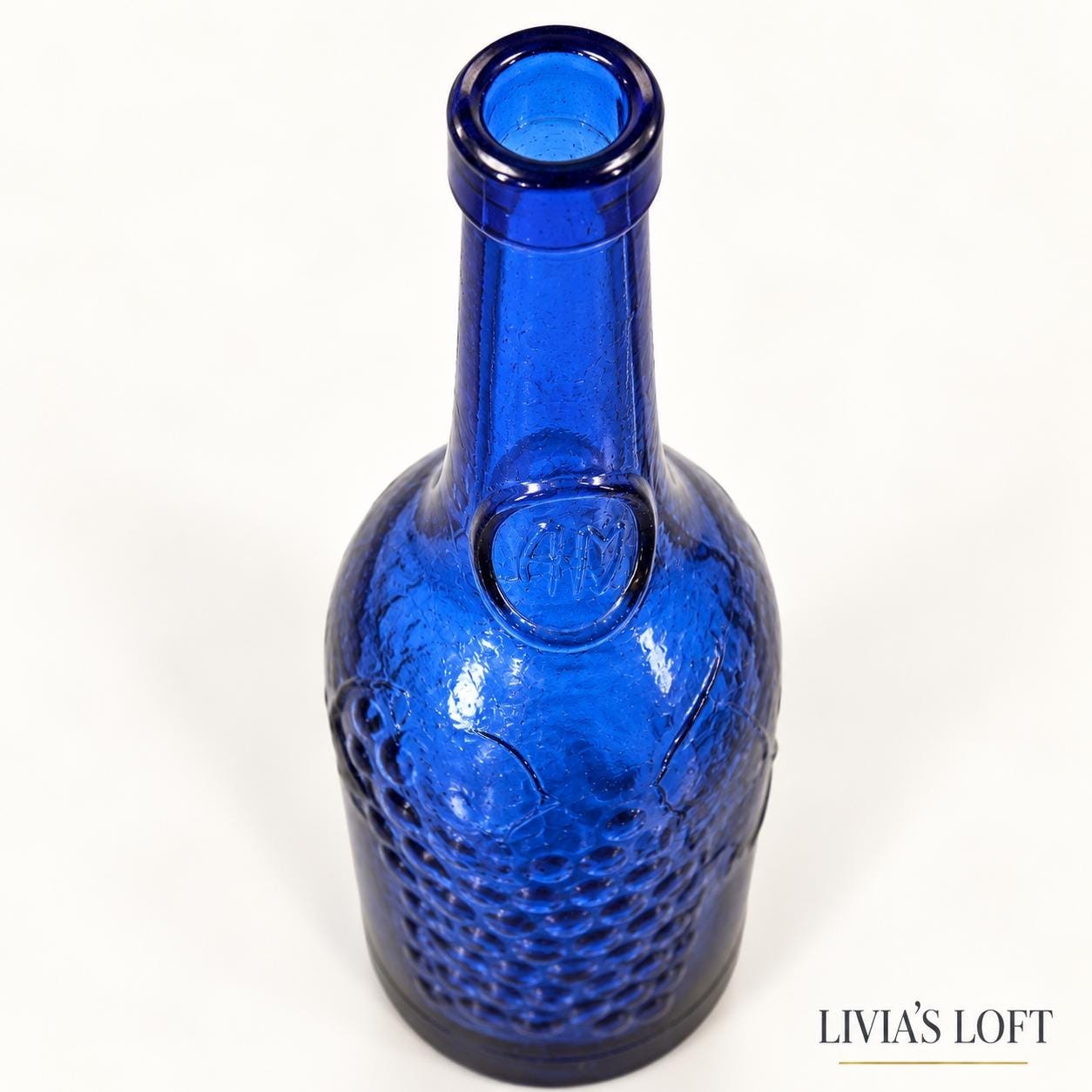 Vintage Cobalt Blue Textured Glass Bottle | Embossed Grapes & Leaves | 12” Decorative Art Glass Bottle, view 5