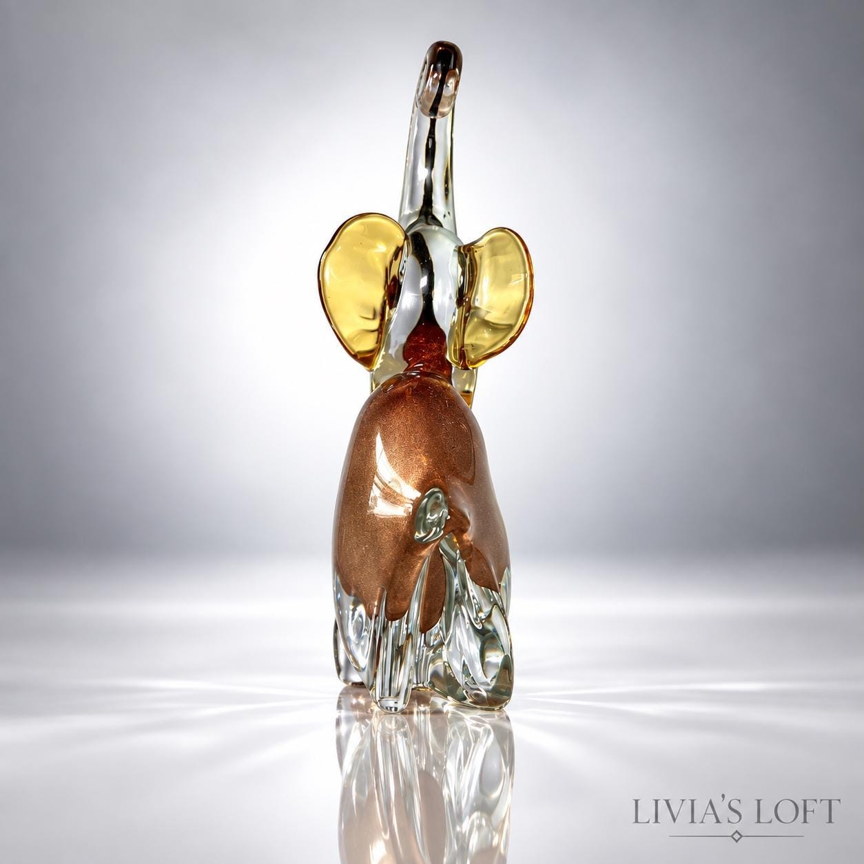 Vintage Art Glass Elephant Figurine: Clear Glass, Bronze Interior, Amber Ears (8" Tall), view 3
