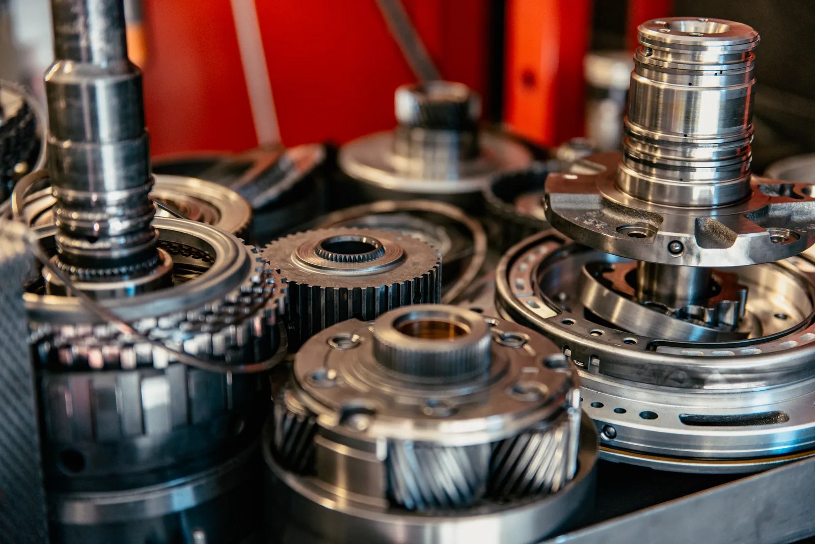 Transmission parts prepared on a diagnostic bench in an automotive repair shop