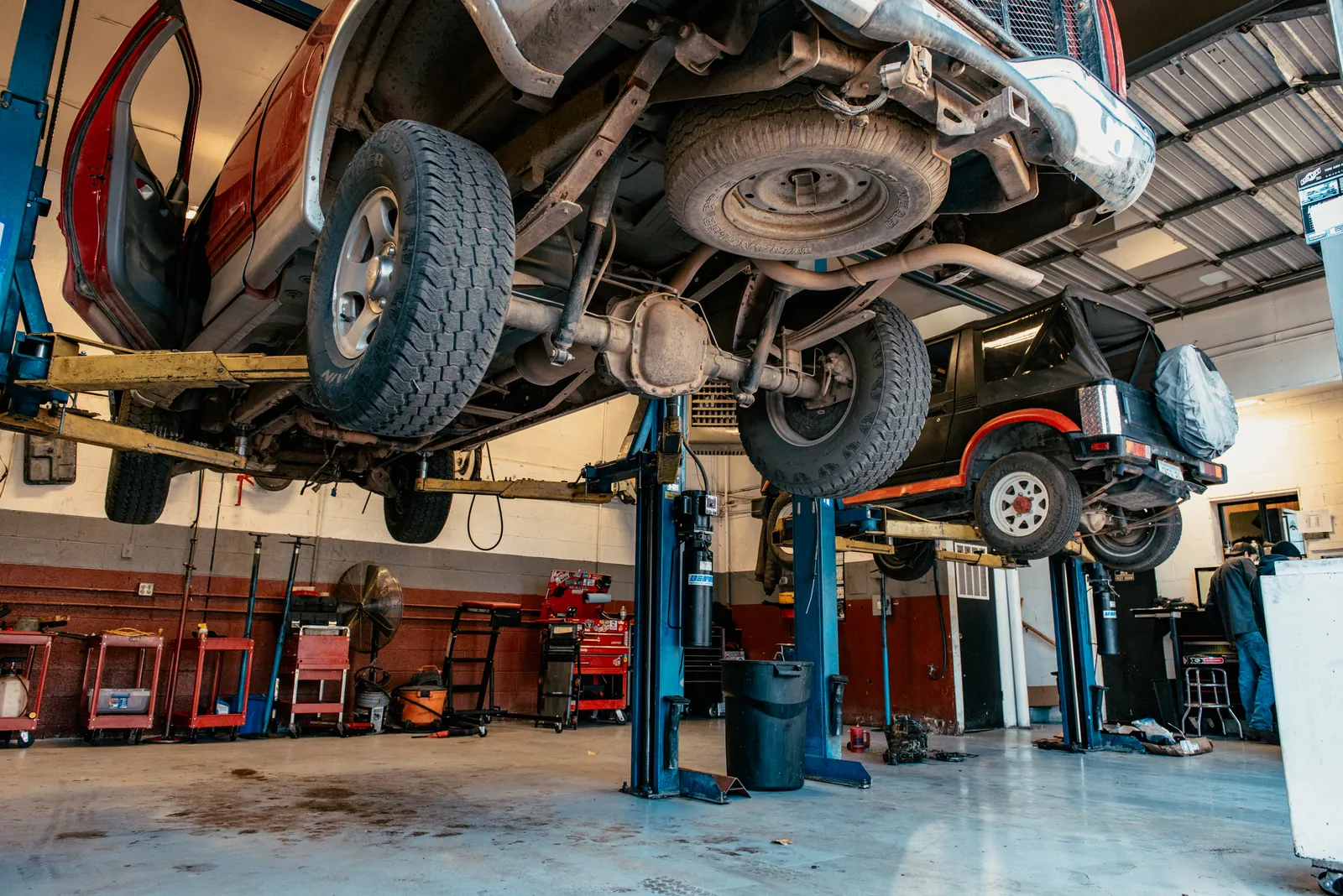 Vehicle lifted in the Advanced Transmission Rebuilding shop