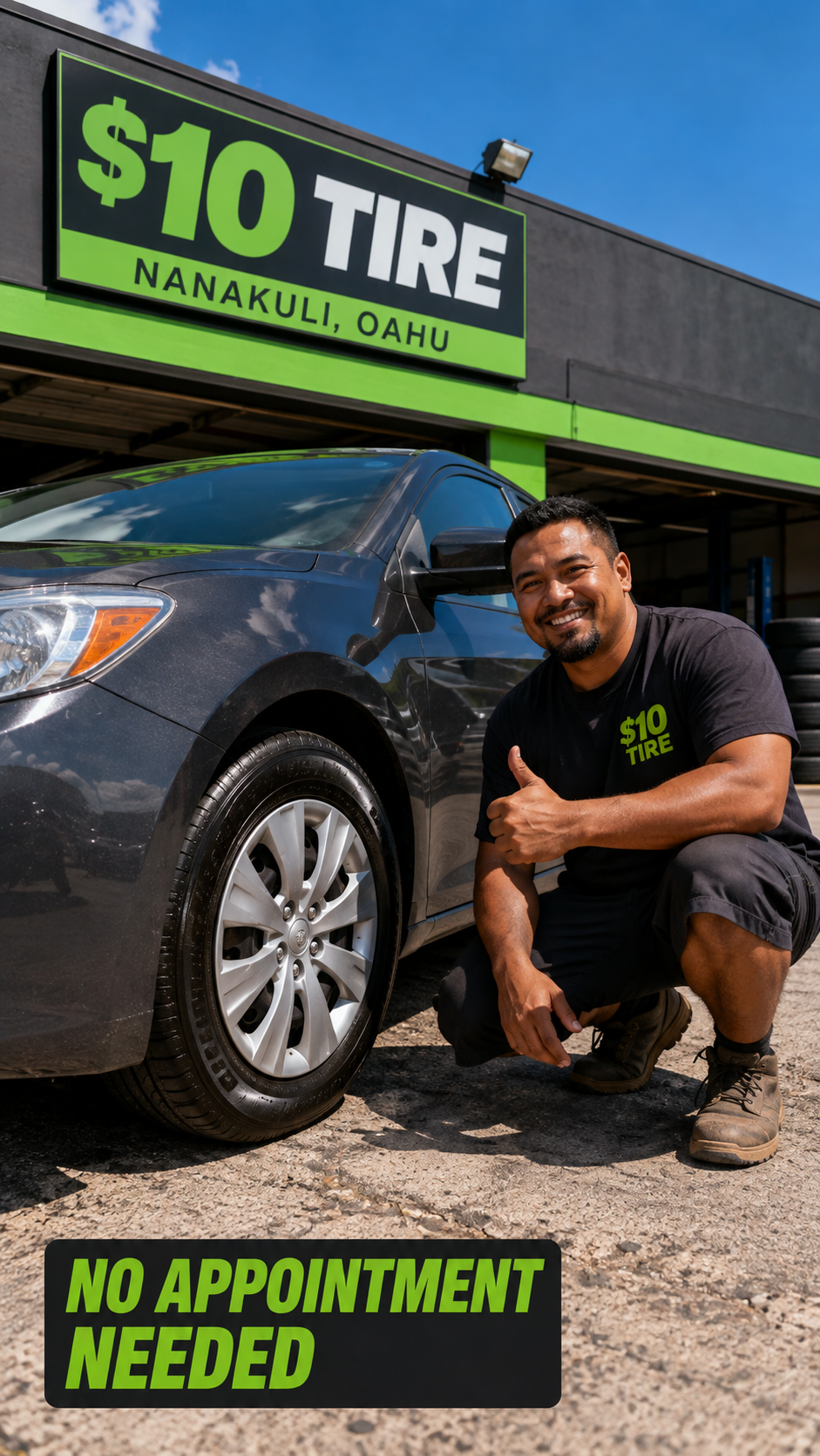 $10 Tire technician beside a vehicle outside the Nanakuli shop
