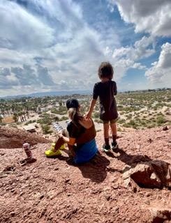 A woman and child looking over the Treasure Valley