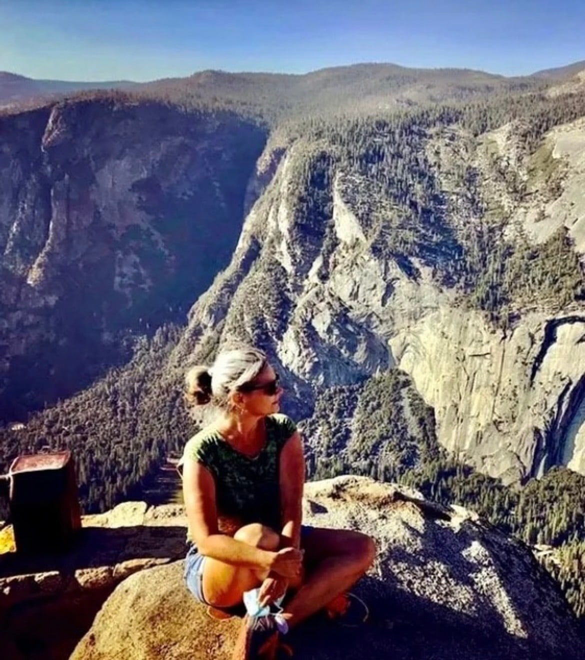 A woman taking a quiet meditation pause outdoors