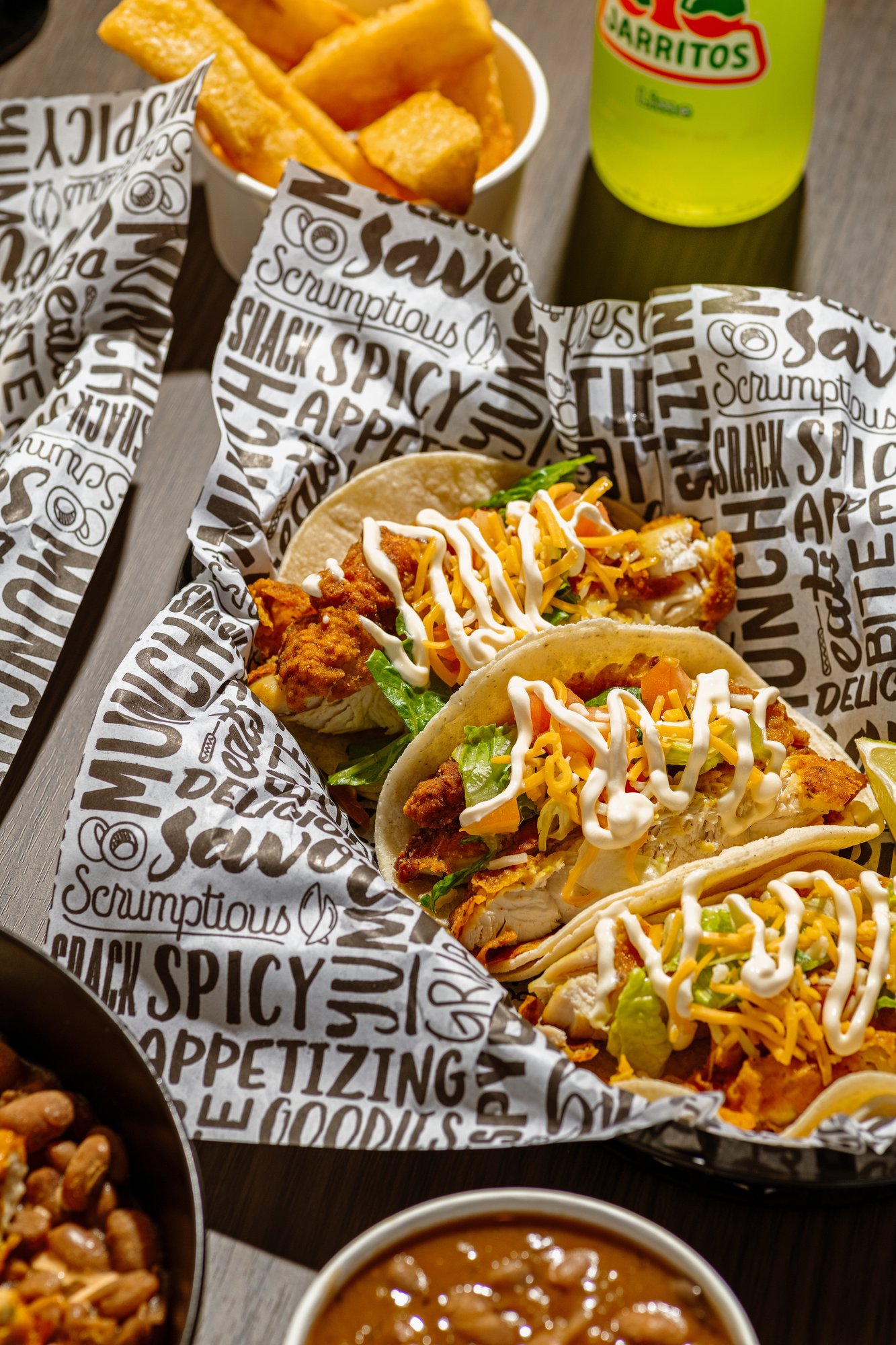 Tito’s chicken tacos with fries and salsa