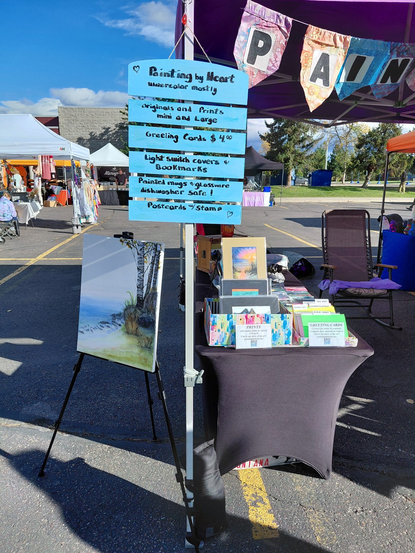 Painting by Heart market booth with artwork, prints and greeting cards