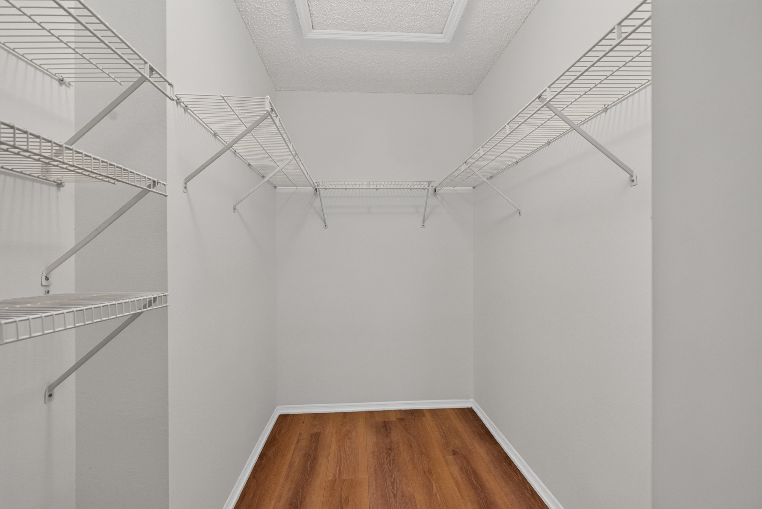 Walk-in primary closet at 1053 Sugarberry Trail
