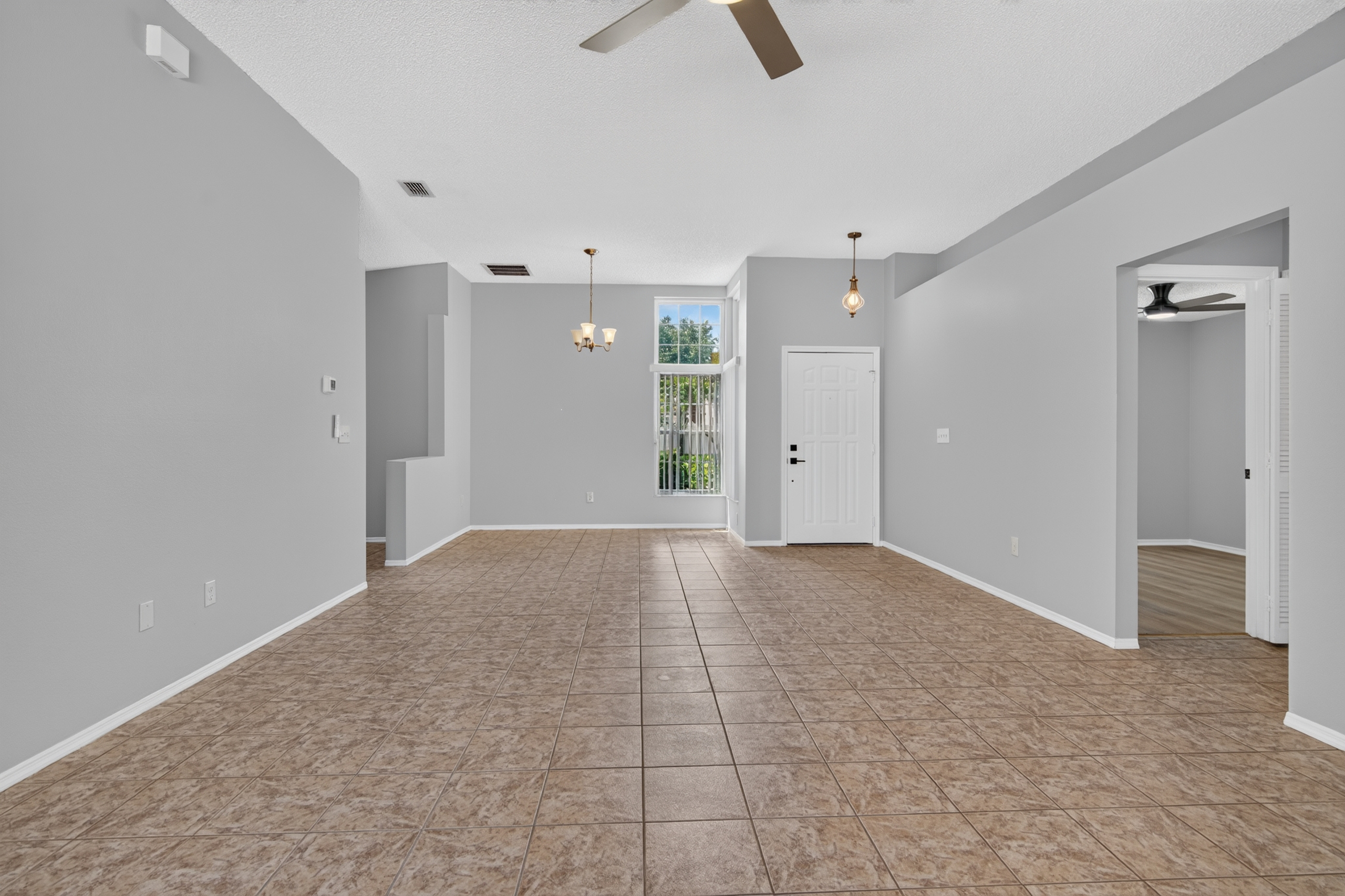 Open living area and foyer at 1053 Sugarberry Trail