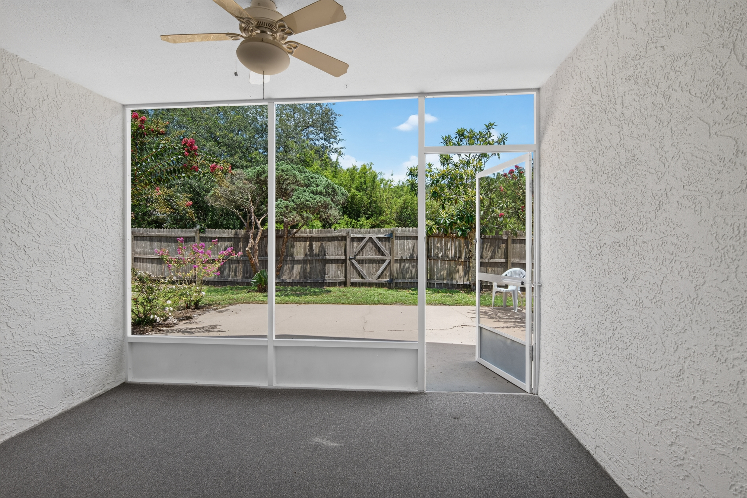 Screened and covered patio at 1053 Sugarberry Trail