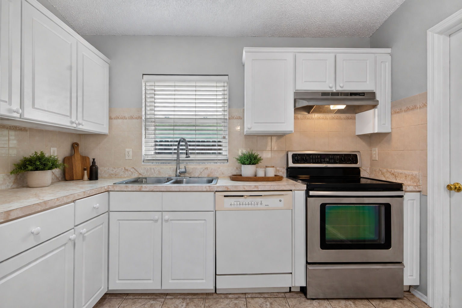 Virtually staged kitchen at 1053 Sugarberry Trail